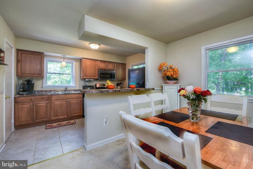 Well maintained end unit townhome offering 3 finished levels, 3BR + lower level den,2.5 baths and over 1900 sq.ft. of space in the heart of Dale City! Stainless steel appliances, ceramic tiles, up dated baths. Huge fenced back yard. Nearby schools, shops,min to   I-95, commuter lots, public rec centers, and public transportation...Shed and microwave sold as-is.