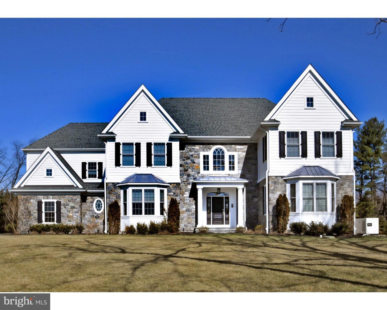 Exciting opportunity to purchase a resale in WICKERFIELD ESTATES, situated on over 2 acres on one of the best lots in this Blue Bell enclave of amazing custom Manor Homes. This Outstanding 6 Bedroom, 9-Year-Old Stone Colonial with 4-CAR GARAGE & over 7500 sq ft including the Finished Daylight Basement with IN-LAW SUITE, built by Bentley Homes, has an open floor plan and fantastic upgrades throughout, including hardwood floors, 9' ceiling on both floors, custom millwork and high-end finishes. This SMART HOUSE features "Control 4" computer screens in most rooms to control music, TVs and security with all equipment included. The spacious formal Dining Room features crown molding & a walkout bay window. The Living Room, Family Room & Kitchen are all open to each other for amazing entertaining flow. The formal Living Room offers the 1st of 3 gas fireplaces and the gorgeous Family Room provides the 2nd fireplace, coffered ceiling, wall-mounted TV & 2 sets of French doors providing exterior access. The Chef's DREAM KITCHEN is exquisite, featuring granite counters on the island & perimeter, stainless Bosch double wall ovens, microwave drawer, Wolf 6-burner commercial stove w/grill & hood, tiled backsplash, glass cabinets & Breakfast Room with French door accessing the rear of the property. A French door from the Living Room opens to the STUDY w/custom bookshelves. 2 Powder Rooms & a large MUD ROOM with back staircase complete the 1st floor. The PRIMARY RETREAT offers a Sitting Room with 3rd fireplace, gorgeous bedroom w/tray ceiling, 2 professionally organized walk-in closets & a luxurious Full Bath w/marble counters, soaking tub & Spa-Shower with multiple shower heads. 4 additional bedrooms feature en-suite Full Baths including 1 Jack and Jill. The 2nd Floor Laundry Room includes the washer and dryer plus built-ins and sink. The Daylight Lower Level includes an extra-large Recreation Room, 6th Bedroom/In-Law/Au-Pair Room w/nearby Full Bath, Playroom or 2nd Office & Gym w/rubber floor plus ample storage. Flagstone steps lead from the Family Room to the beautiful, tree-lined rear yard w/ample impervious surface available for a pool. Other excellent features include a whole house generator & 6 zones of HVAC. Located within highly rated Wissahickon School District & close to excellent private schools; minutes from the town of Ambler w/train to center city, & easy access to major routes, great shopping & restaurants. NO NEED TO BUILD- this SMART HOUSE awaits!!