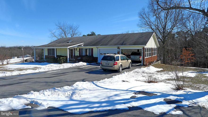 Love the Country Life? You'll love this property--GREAT Ranch home with open flow from kitchen to dining area to Living room plus a full huge basement that could easily be turned into an in-law suite. Beautiful panoramic view of Sleepy Creek Mtn & neighboring pastures. Oversized garage that could be an outside sunroom--ceiling fans & lots of big windows.Peace & Quiet-No HOA. This is the life.