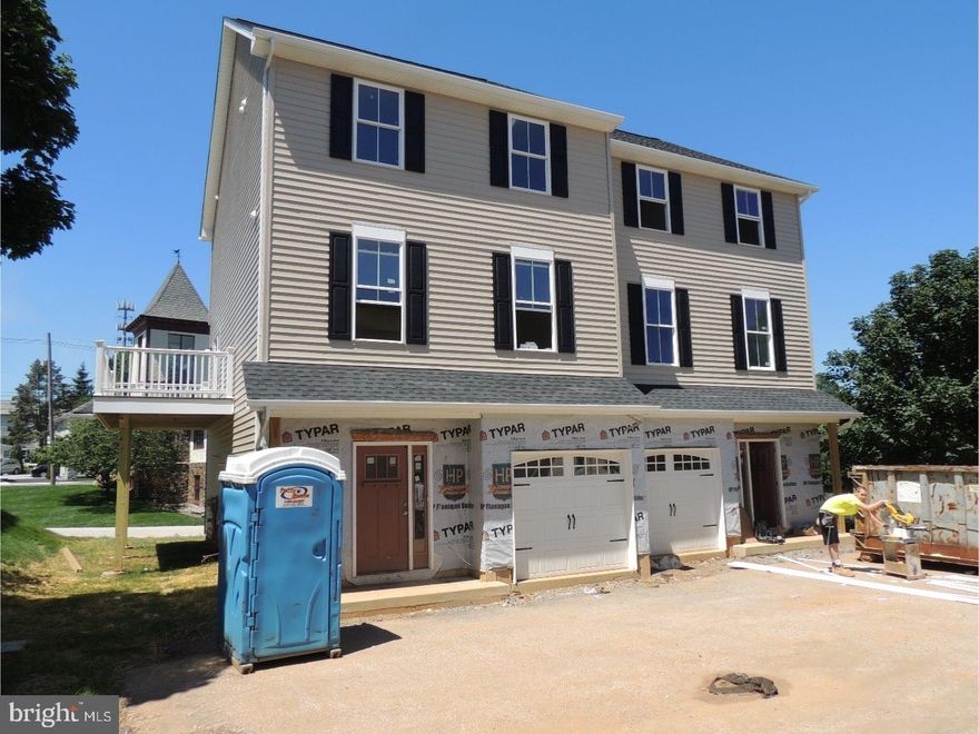 This new 3 bedroom, 2.5 bath townhome in the Village of Berwyn is the best new construction value in the T/E School District. It is within walking distance to the Berwyn Train Station and shops & restaurants within the Village of Berwyn. This 22' wide townhome offers plenty of interior space with its great layout and a 1 car garage. Entering in the lower level with its hardwood floors and 9' ceiling, you have access to the large 22'x12.5' Rec Room as well as the 10'x 20.5' Garage. Upon taking the stairs with their oak treads and painted risers, you walk into main living area with its open concept floor plan. The 21'x16' Kitchen has plenty of room featuring an eating area, large 10'x4' island, pantry, 42" cabinets, quartz countertops, recessed lighting and Stainless Steel appliances. Off the eating area of the Kitchen is a sliding door to the composite deck. The Kitchen sink located in the Island overlooks eating area. This Living Room is great for however you want to set up the room. The main living floor also has a Powder Room with a pedestal sink. The upper level has 3 bedrooms with a laundry room located off of the hallway. The Master Bedroom is 15.5'x14.5' with a ceiling fan pre-wire. The Master Bedroom has a walk-in closet and bathroom that has double vanity and an oversized shower stall with a seat. The other 2 Bedrooms have similar layouts and are serviced by the Hall Bathroom. The home is part of an HOA and the HOA covers lawn maintenance and snow removal. House to be complete in the beginning of July.