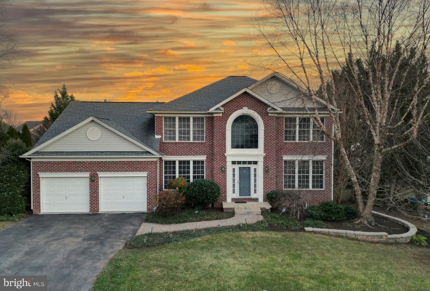 Perfect location and a spectacular home!  Welcome to this gorgeous four-bedroom, two full and one half bath award-winning Livingston floor plan on a .43 acre private lot in Clover Hill III, Frederick's premier neighborhood.  This amazing home features a gourmet eat-in kitchen with a center island, breakfast bar, granite counters, gas cooktop, double oven, recessed & pendant lighting, and ceramic tile floors.   The kitchen is open to the casual dining area with sliding door access to the deck, and the amazing great room/family room with cathedral ceiling, custom skylights, gas fireplace, atrium window, and gorgeous hardwood floors.  The dining room features hardwood floors, a custom bay window, chair rail, and crown moldings, and is next to the living room, with knee wall & decorator columns, custom draperies, and gleaming hardwoods.  Rounding out the main level is an impressive entry foyer with a vaulted ceiling, a home office/study, and an updated half bath, each with hardwood floors.  Upstairs is a spectacular owner's suite with a sitting room, large walk-in closet, and super-bath with soaking tub, separate shower, double sink, and ceramic tile floors.  There are also three additional bedrooms upstairs and a convenient second full bathroom.  Downstairs is a finished walkout-level basement with a huge recreation room and substantial additional unfinished storage space.   Out back is a huge fenced yard with a raised deck with bench seating and stairway access to the lower-level paver patio.  The yard is flat, with mature landscaping and lots of room to play.  The property has been very well maintained: the roof is five years old, the furnace and air conditioning unit was replaced in 2017, the appliances were recently replaced (the new stainless steel double oven has been ordered), and the home is in fabulous condition.  The location of this home is wonderful.  The lot is very private, and is close to the fabulous 13-acre private park, with walking paths, baseball/softball diamonds, basketball, clubhouse, pavilion, sports leagues, and community pool,  home of the Division 1 Clover Hill Hurricanes swim team.   The neighborhood is close to downtown Frederick, shopping, groceries, and all major commuting routes, but is outside the City of Frederick, so there are NO CITY TAXES!  Hurry!