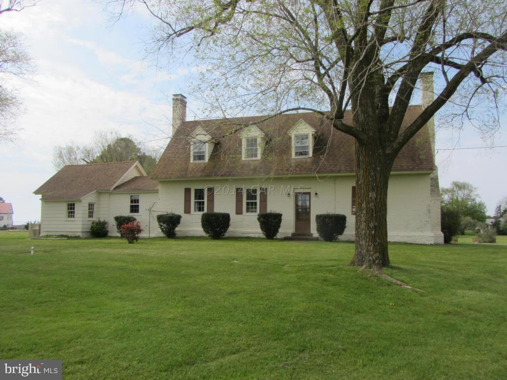Mt Ephram built in 1668 Available for the first time in almost 50 years. This home is built like a fortress with 18 inch thick walls. Most of the home is period with an oversized Fireplace in the oversized living room. Window sills over 12 inches deep. Boat dock on protected canal, full length rear screened in porch. Basement with great detail for a wine cellar. Partial Veiw of the Chincoteague Bay with a sprawling lawn. The adjoining property of 1.2 acres with large barn with newer roof and siding is available.