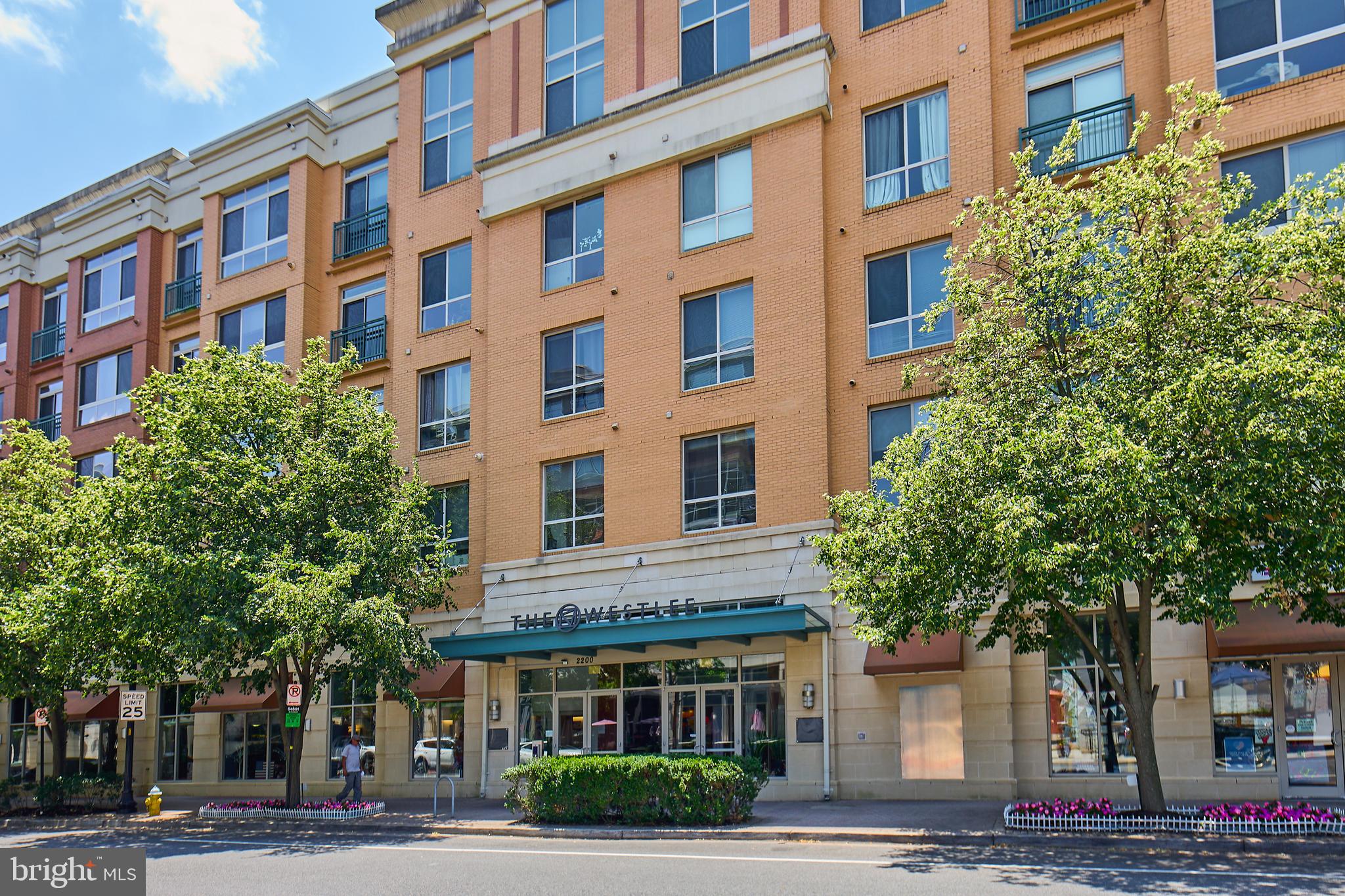 Welcome to The WestLee – Where Style Meets Convenience!
This spacious and sun-drenched 1BR + den, 1BA condo is the perfect blend of modern comfort and urban accessibility. With tall ceilings, hardwood floors, and oversized windows, the open-concept living area feels bright, airy, and just right for relaxing or entertaining. The den offers versatile space —perfect for a home office, guest room, or cozy reading nook.
The kitchen features granite counters, stainless steel appliances, and a large center island making it as functional as it is stylish. You'll love the in-unit washer and dryer, ample storage, and garage parking—plus, the building itself offers a fitness center, party room, and front desk staff.
Located just 1/2 mile from the East Falls Church Metro, commuting to DC, Tysons, or beyond is a breeze. Craving coffee, dinner, or weekend adventure? You're in luck! Westover Village, Falls Church City, and the W\&OD Trail are all nearby. Super close to restaurants, cafes, parks, a Saturday morning Farmer's Market, breweries, and bike paths—this location has it all.
Whether you're a first-time buyer, savvy investor, or simply ready to love where you live, this WestLee gem is not to be missed.
Come see what makes The WestLee one of North Arlington’s most loved condo communities!
