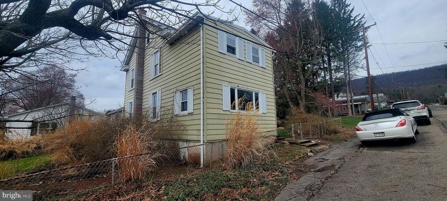 Attention investors and contractors!  Rehab/investment opportunity.  Neighboorhood corner lot in Williamstown.  Property with good bones in need of some TLC.  This property is perfect for those looking to add value with updates and repairs.  3 bd/1 bath with an extra room accessible through bedroom.