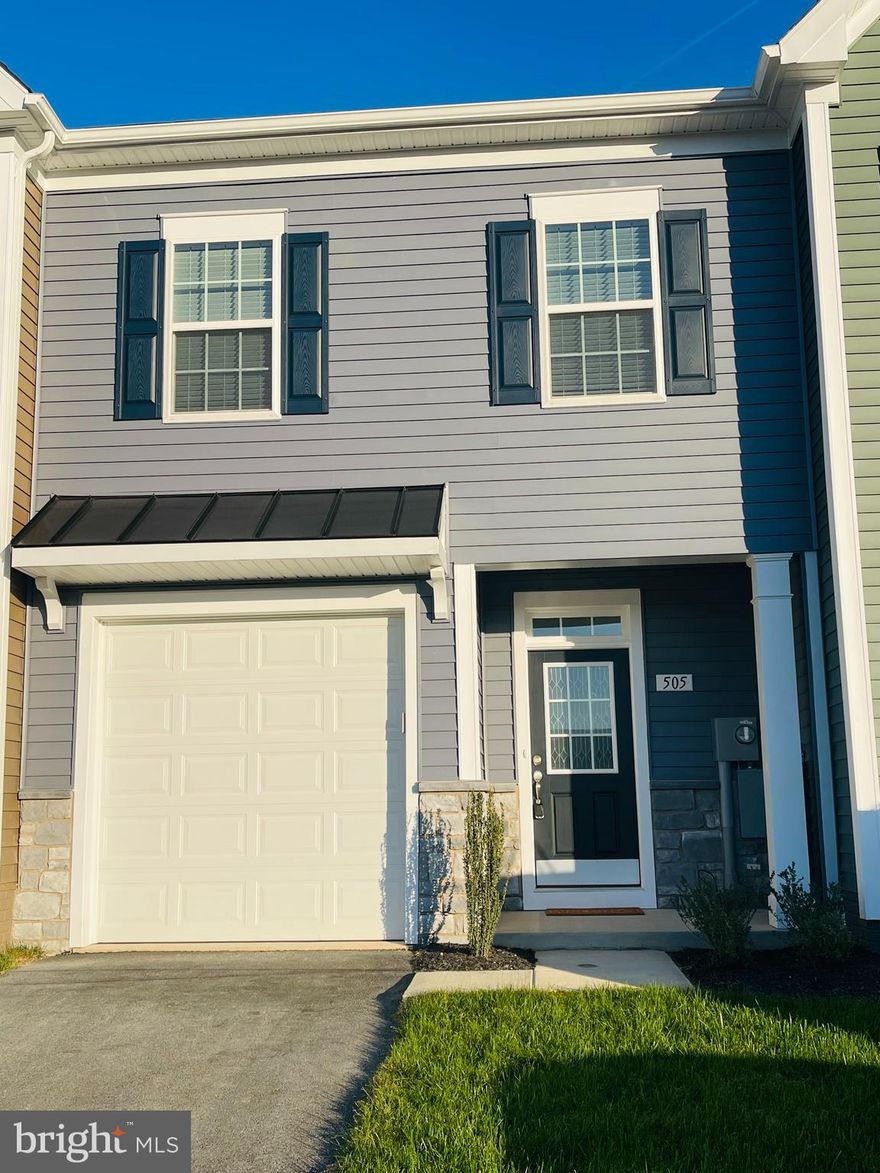 Welcome to 505 Hillsdale Place, nested in Martinsburg Station neighborhood of Martinsburg, WV! Be the first to call this beautiful newly built 3 bedroom, 2 bathroom townhome yours. The spacious open concept living area is perfect for family gatherings, while the modern kitchen features stainless steel appliances and ample storage space. You will love the primary suite 12'4' x 14'-7' with huge walk in closet and its own private bathroom with double sink. Outside, the beautifully landscaped yard , which comes with a lawn mower left by owner to help you maintain the property with ease. Enjoy community amenities like a clubhouse, pools, and walking trails with breathtaking mountain views. Embrace this opportunity for sophisticated, convenient living.  The owner has added window blinds,  Full size Washer/Dryer, water softner, ceiling fans and additional lighting. Pets are welcome 🐶 Conveniently located near shopping,  dining and easy access to I-81 and other major highways. Don't miss this opportunity- schedule your tour today!