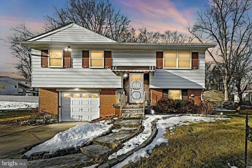 This charming home in Windsor Mill is a must-see, offering 3 bedrooms and 1 full bathroom. The property boasts an enclosed porch with sliding  door access off the dining room and kitchen, perfect for enjoying quiet mornings or entertaining. The spacious backyard is ideal for outdoor activities, while the attached garage includes convenient home access and a versatile area for a workshop or storage. Recent updates include a replaced roof & gutter guard (2023), HVAC system (2023), and water heater (2023). Warranty information in disclosures for HVAC - Roof warranty paperwork is being obtained. With quick access to 695 and nearby shopping, this home is overflowing with potential!