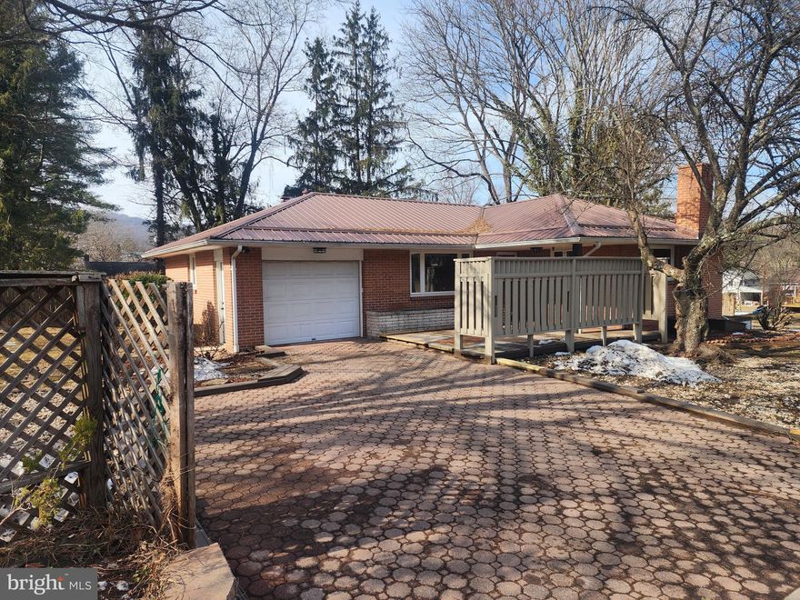Updated Brick Rancher on One of Carpendale’s Finest Lots! This unique home offers exceptional outdoor living with a spacious, level yard featuring an in-ground pool, covered pool deck, concrete shuffleboard court, and multiple outbuildings—perfect for entertaining, hobbies, or relaxation.  (condition and functionality of pool is unknown)  Inside, enjoy a distinctive blend of retro charm with custom woodwork throughout and modern updates, including recent improvements to HVAC, plumbing, electric, flooring, quartz countertops, and stainless steel appliances.  Located in West Virginia for lower property taxes while remaining just minutes from historic Cumberland, MD for shopping, healthcare, and recreation. A rare opportunity combining character, comfort, and an outstanding setting.