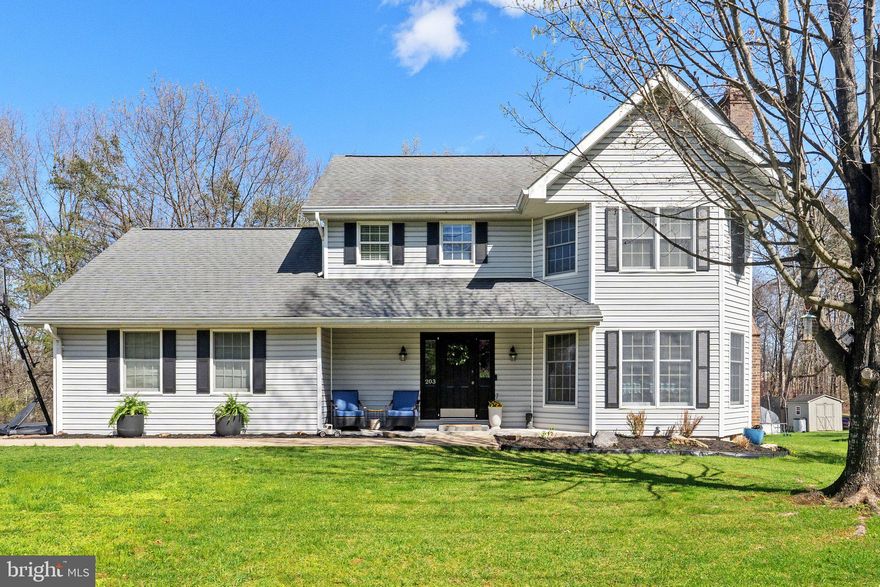 Looking for your slice of paradise near the lake? Check out this three-bedroom, 2.5 bath home in Lake Holiday Estates. It’s roomy, well maintained, sits on a large, level lot, and gives you access to all the amenities of this lake community. Inside, the elegant neutrals, hardwood floors, and a desirable floorplan give this home instant charm. A generous living room accommodates all your furniture, includes a painted brick fireplace, and is infused with light from a bank of windows. The gourmet kitchen features trendy gray cabinets with a complimentary backsplash and countertops, a wood-topped matching island, and a chic, easy-to-clean floor. Use the adjacent space for informal dining or your favorite display pieces. Enter the dining room, lit by big windows and brimming with space for more than your table and chairs. The laundry
room and a half-bath complete this level. Upstairs find all three bedrooms, including the decadent primary suite with its own full bath and a walk-in closet. A full bath serves the other two pleasing bedrooms. Head outside to enjoy a deck large enough for dining and sitting furniture overlooking the grassy backyard backing to trees. You’ll appreciate the open space, plus the storage shed with double doors for drive-in access. The covered front porch provides another option for sitting a spell. In the attached two-garage,
there’s also a finished room perfect for a home office. And of course, this home comes with amenities galore, including the lake, beaches, athletic fields and courts, exercise facilities, club house, library, boat ramp and pier/dock, jog/walk path, dog park, and more.