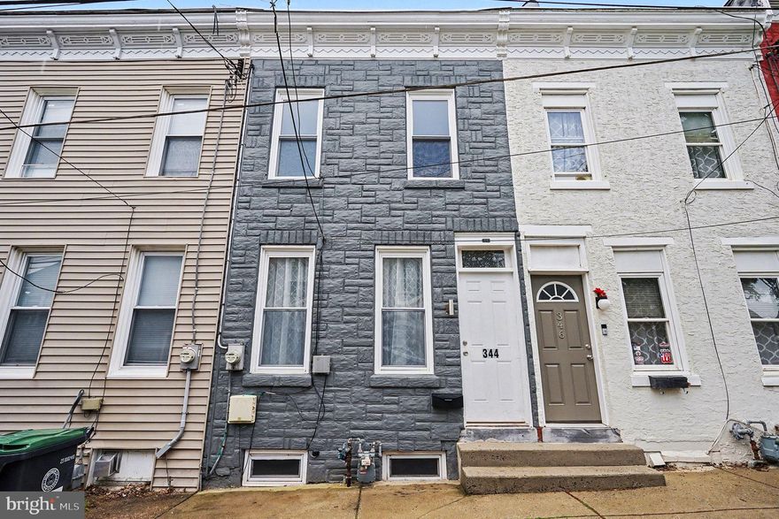Welcome to 344 Grover Street, a charming Colonial-style townhouse in the heart of Phoenixville, blending classic character with modern updates. Built in 1920, this 2-bedroom, 1-bath home offers 1,124 sq. ft. of comfortable living space.

Inside, you’ll find brand-new vinyl plank flooring throughout the first floor, fresh paint, and stylish new light fixtures that create a bright and inviting atmosphere. The kitchen is both functional and stylish, featuring new quartz countertop with a striking waterfall edge, ample pantry storage, along with a gas stove that makes cooking a pleasure for any home chef—ideal for everyday cooking and entertaining alike. The combination living and dining area provides a cozy, versatile space perfect for gatherings.

Upstairs, you’ll find new carpeting, two comfortable bedrooms, and a versatile nook perfect for a home office or sitting area. The home also includes a full basement, top-loading washer and front-loading dryer, and a recently updated gas boiler and water heater. Classic radiator heat offers efficient, even warmth throughout.

Enjoy a private patio, charming street views, and easy on-street parking. Located within walking distance to downtown Bridge Street in Phoenixville, with shops, dining, parks, and public transit nearby, this move-in-ready home offers convenience, comfort, and timeless appeal.