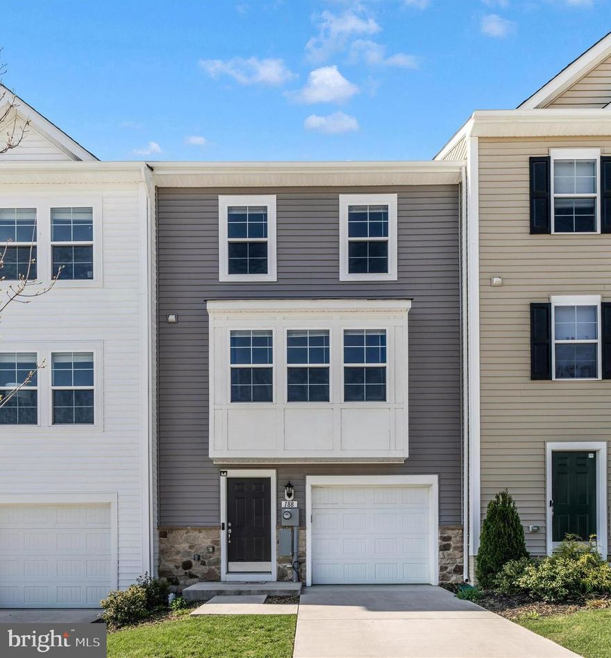 Enjoy the moutain views from this desirable 3-level 2023 garage townhome offering privacy and convenience off easy commuting routes in the heart of Charles Town. 3BR, 3.5 Baths, finished lower level with full bath. Eat in kitchen with huge granite island, pantry, stainless steel appliances and stylish pendant and recessed light. Box bay living room makes for a lot of natural light - luxury vinyl flooring entire level. Primary bedroom has vaulted ceiling, walk in closet and spacious primary bath. Extra storage space in oversized garage, off street parking too. Ready for quick sale, this could be yours!