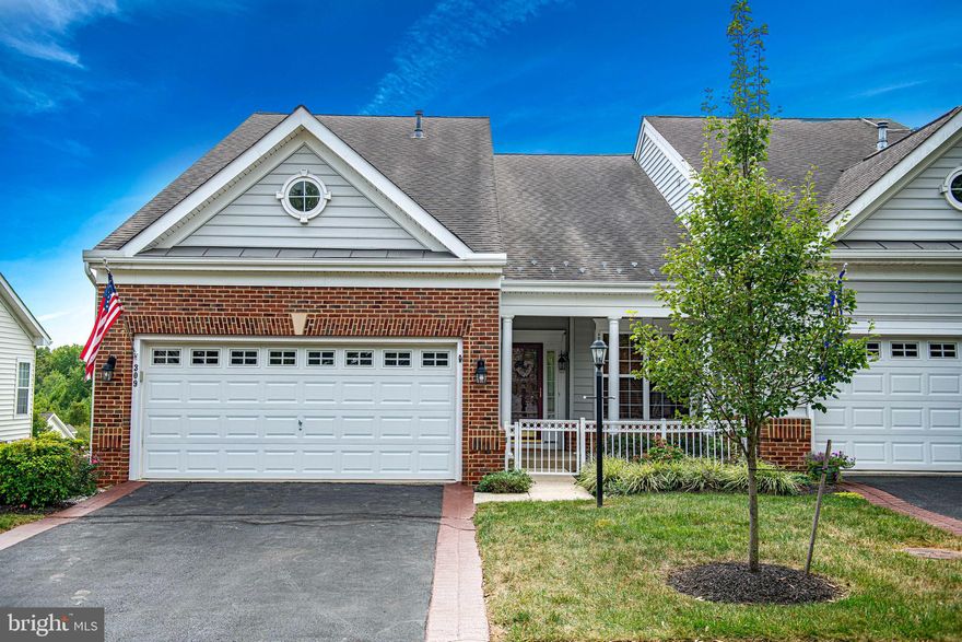 Welcome to Bulle Rock where life imitates vacation. This beautiful 3 bedroom, 4 full bathroom house offers plenty of space and amazing amenities.  Spacious eat-in kitchen with hardwood floors and granite counters.  The Great room has hardwood floors, a vaulted ceiling with double sided gas fireplace with the sunroom on the other side..  The deck off the sunroom offers a magnificent view of trees and a distant view of the Bulle Rock golf course.  Loft area overlooks the Great Room and has a bedroom with a full bath on this level.  An added bonus is the finished basement and large storage area.  Don't miss this opportunity, schedule your showing today!