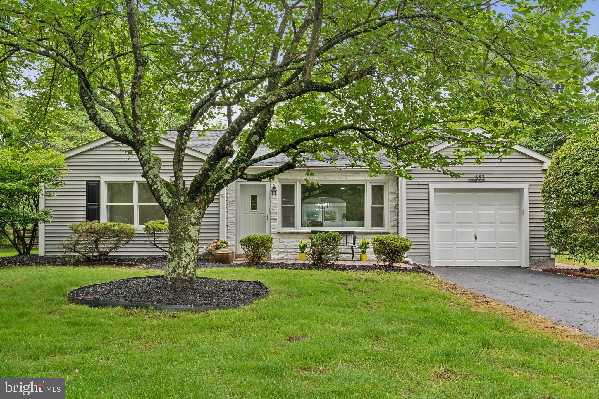 Welcome to your dream home at 533 Tennis Avenue in Ambler, PA, where elegance meets contemporary comfort. This fully renovated gem, with a freshly painted interior, offers 1,672 square feet of modern living space perfectly designed for relaxation and enjoyment. As you enter the home, you'll immediately notice the bright interior featuring refinished hardwood floors and a seamless transition between rooms.
The newly renovated kitchen is equipped with state-of-the-art appliances, providing a perfect setting for any occasion. All light switches throughout the house toggle between bright and ambient settings, ensuring your comfort in every space, including the California-style closets. Adding to the luxurious feel, a sophisticated sound system with speakers is incorporated throughout the entire house, allowing you to enjoy music in every room.
This three-bedroom, two-bathroom residence boasts beautifully updated bathrooms and a cozy living room with a gas fireplace, perfect for those chilly evenings. The sunroom, featuring a newly added bar and a washer/dryer unit, offers a serene view of the inviting below-ground pool.
Step outside to enjoy the large, fenced, tree-lined backyard, which is a private oasis featuring an in-ground pool that has been freshly painted, with all new tile, and professionally opened for your delight. The exterior is immaculate, with a new roof and fresh paint enhancing its charm. With a brand-new central AC unit and hot water baseboard heating, this home ensures comfort year-round. Enjoy convenient access to 309, 202, the PA Turnpike, and Ambler train station. You're just minutes from Ambler Borough and Springhouse, offering an abundance of boutique shopping, a movie theater, and both casual and formal dining options. Embrace the harmonious blend of style, functionality, and location that 533 Tennis Avenue offers. You will love the low taxes here! Your Next Perfect Home awaits!