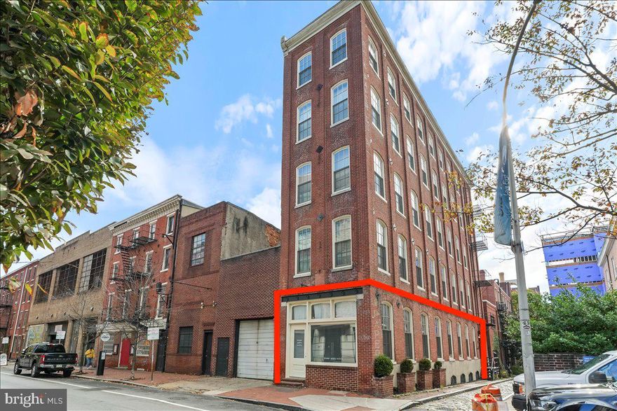 Make your truly unique home in this one-of-a-kind two-bedroom, two-bathroom condominium featuring a highly flexible two-level layout, gorgeous historic architectural details, and an ideal Old City location. Zoning, which allows for residential, commercial, or mixed use, makes this unit a rare find for business owners, residential homebuyers and investors alike.
A private street-level entrance ushers you inside the 1,732-square-foot space filled with soaring 12-foot-tall original beamed ceilings, swaths of beautiful brick, hardwood floors, designer lighting, and bright northern and western exposures. Expansive arched windows replaced in 2019 flood this upper level with sunlight and views over the quaint adjacent alley and gardens.
Previously used as an art gallery and event space, the massive 437-square-foot front room is perfect as a commercial business or vast living room, with plenty of space to add additional bedrooms with the appropriate approvals. The rear of this floor includes a bedroom and beautiful full bathroom decorated with transom windows to let sunlight wander throughout.
Head down to the open staircase to discover a lovely kitchen with sleek cabinetry, butcher-block countertops and stainless steel appliances, including a gas range and dishwasher. This windowed full-height level offers expansive sun-kissed rooms for seating, home office and storage use alongside another full bathroom. A laundry room and central HVAC add comfort and convenience to this unique space that was thoroughly updated in 2006.
Built in the 1890s, this registered historic building housed a number of industrial firms over the years, including a cast-iron manufacturer, a cigar company, and Saxe Paper Company whose faded name is visible on the brick façade along Orianna Street. In 2002, the beautiful five-story building was converted into a self-managed, five-unit condominium with low HOA fees.
Located on a pristine tree-lined street in the heart of Old City, this special home is just inches from glorious outdoor space, including gardens, playgrounds and historic national monuments. Enjoy easy access to fantastic Center City shopping, dining and nightlife. There’s a parking garage just two doors away, and multiple bus lines, PATCO and SEPTA stations, and the Delaware Expressway put the rest of the city within easy reach.