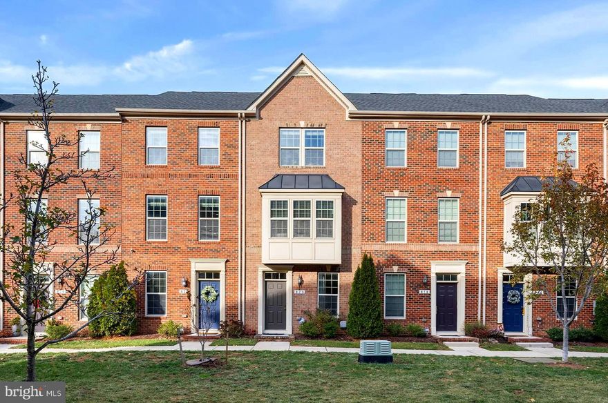 Welcome to 820 S Macon Street in O'Donnell Square! This impeccably appointed three-story home is nestled in the vibrant O'Donnell Square community, showcasing modern elegance and thoughtful features throughout.

The first floor welcomes you with a cozy living room—a versatile space that can easily transform into a home office or den, complete with a convenient half bathroom.

On the main level, enjoy an open floor plan tailored for entertaining. The classic eat-in kitchen features a large island, sleek granite countertops, under-cabinet lighting, and oversized windows that flood the space with natural light. Step out onto the walkout deck—perfect for grilling or enjoying a morning coffee. The large, light-filled living room offers an inviting space for relaxation and gatherings.

The third level boasts two spacious bedrooms. The primary suite offers a tranquil retreat with its own en-suite bathroom and generous closet space. The second bedroom, complemented by a nearby hall bathroom, is ideal for guests or a roommate setup, providing both comfort and flexibility.

The finished garage is a standout feature, complete with drywall, custom shelving, and a professionally resurfaced epoxy floor, merging practicality with style.

This home seamlessly blends comfort, style, and convenience, making it the perfect choice for modern living.