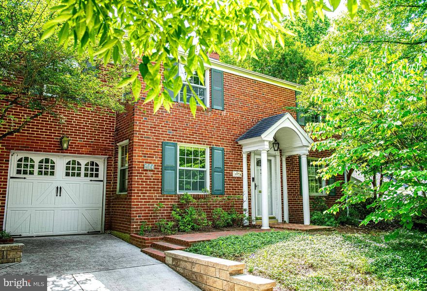 Plant your roots in historic West Towson with this updated brick colonial in the heart of peaceful Charles Terrace. Just a block away from Loyola-Blakefield, this charming home sits on nearly a  quarter-acre of mature landscaping with a private, fully-fenced back yard. A large patio for entertaining and established, low-maintenance perennial beds await your evening cocktails and weekend BBQs.  Inside, you will find a spacious, updated kitchen with GE and Bosch stainless appliances, featuring a large peninsula with family seating, pull-out cabinet shelving, and quiet-close doors and drawers. Past the kitchen lies a truly GREAT room with coffered ceiling, skylights, and windows galore.  A built-in pellet stove, entertainment unit, and storage benches complement exposed brick walls and freshly refinished oak floors. Off the great room through glass French doors is a formal living room/den with a large wood-burning fireplace.  Rounding out the first floor is a half-bath and sizable flex room ideal for an office/craftroom or mudroom with outdoor and garage access. Retreat upstairs where you’ll find two bedrooms, a full bath, a stacked washer and dryer, and an owners’ suite designed to wow. Vaulted ceilings, dramatic electric fireplace, two vanities, a clawfoot tub, the suite is flanked by more than half-a-dozen windows and unique wood accents. The property features a whole-house fan and three heating and cooling zones for maximum efficiency. Come make yourself at home in West Towson.