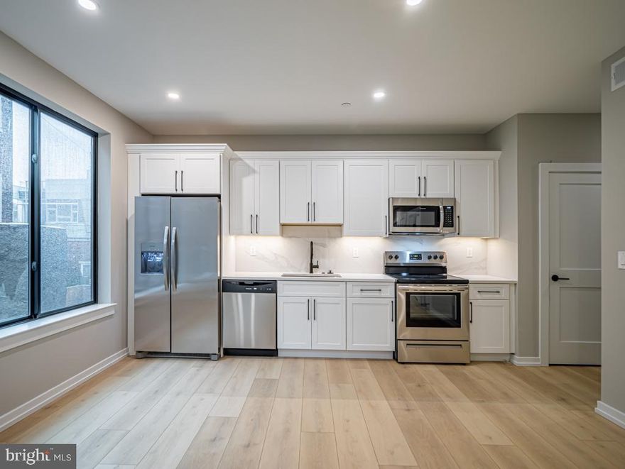 Beautiful brand new construction in the heart of Bella Vista. Kitchen features quartz counters, stainless appliances, and seating at the island. Large living room with fantastic natural light. Bathroom features porcelain tile and large showers with rain shower heads and frameless glass shower doors. Located in a wonderful neighborhood with a walkability score of 98/100 - walk to the Italian Market, Whole Foods, Sprouts Farmers Market, Angelos Pizzeria, Starbucks, South St, Center City and much more!