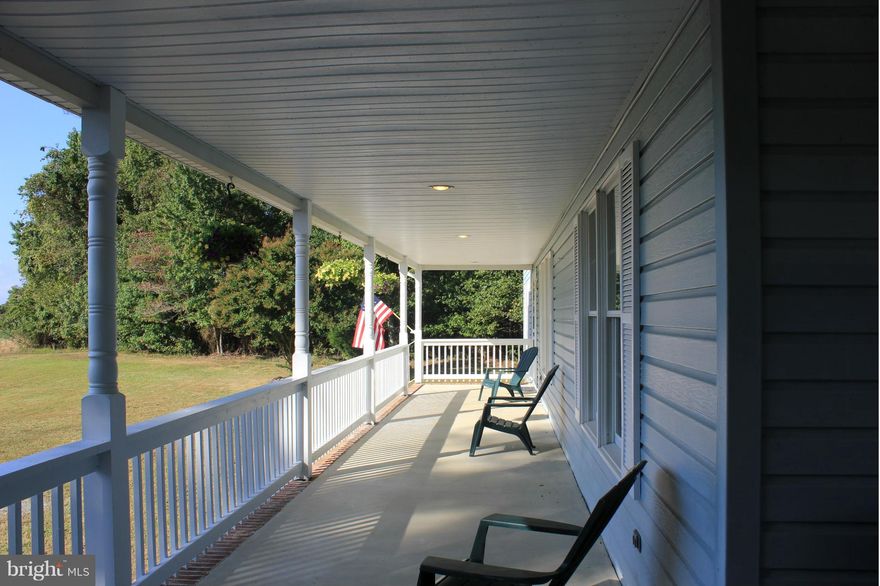 PRICE REDUCTION - MOTIVATED AND READY TO SELL!   Spacious farmhouse (almost 5000 sq. ft.) nestled on a private water view lot! Three main level bedrooms and 2 baths, HUGE FR with stone fireplace and well-appointed kitchen.   Private second level master suite w/bath and WIC, additional FR w/wet bar and half bath!  Unfinished basement, wrap porch and concrete pad!  BRING AN OFFER!