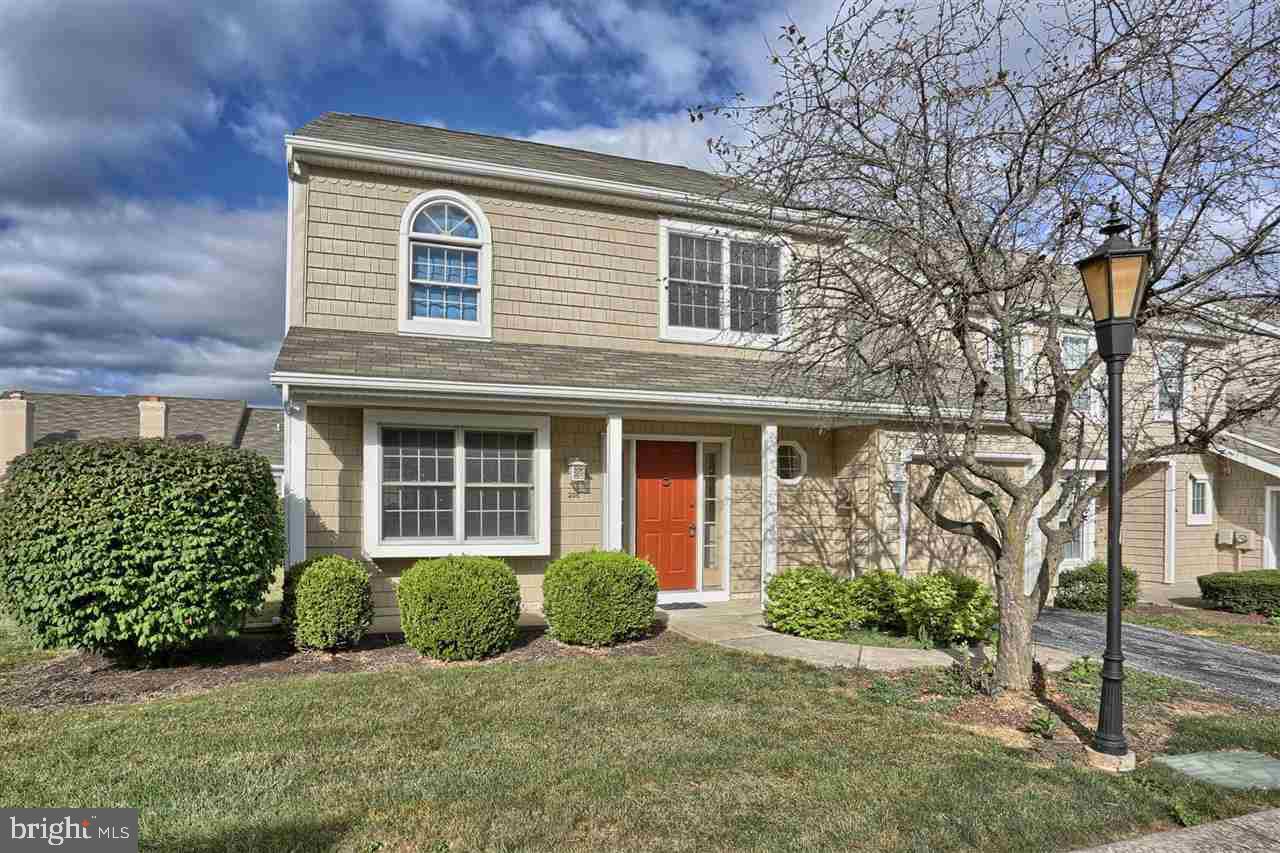End-unit 2 Story townhouse. Tile flr in foyer. LR/DR combo w/door to rear private patio. Kitchen w/eat-in area & dining room pass-thru. Large powder room. 2 bedrooms on second floor each with private full bath. 2nd flr laundry. 1car garage. Heat Pump/AC. Home Warranty included.