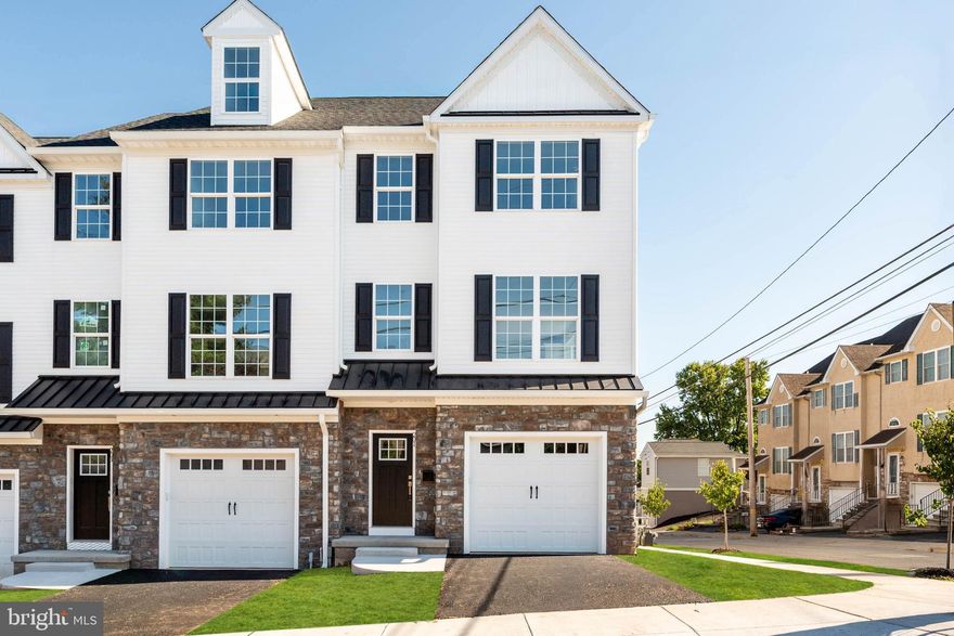 No HOA. Private backyards that can be fenced. Only six homes available! Some units are quick delivery and others you can still make selections and truly make it your own. Welcome to Bridgeview Crossing, a boutique townhome community featuring just seven exclusive residences, thoughtfully built by Vuotto Builders, a respected custom home builder known for quality craftsmanship and attention to detail. These beautifully designed homes offer spacious 3- and 4-bedroom floor plans, 2.5 bathrooms, and three levels of well-planned living space, combining modern luxury with everyday functionality. Enter from the covered front porch into a welcoming foyer with a coat closet, then continue into the open-concept main level featuring 9-foot ceilings, luxury vinyl flooring, recessed lighting, and abundant natural light. A convenient powder room and pantry enhance the layout without compromising style. The gourmet kitchen is the heart of the home, showcasing an impressive 8-foot island, 42-inch cabinetry, quartz countertops, and a full suite of GE stainless steel appliances. The kitchen flows seamlessly to your private Trex deck, ideal for entertaining or relaxing outdoors, with the added benefit of a backyard that can be fenced for additional privacy. Upstairs, the primary suite offers a peaceful retreat with a walk-in closet and a spa-inspired bathroom featuring dual vanities, tile flooring, and a walk-in shower with a semi-frameless glass door. A spacious second bedroom, full hall bath, linen closet, and a conveniently located laundry area complete this level. All bedrooms are wired for ceiling fans for added comfort and flexibility. The top floor features a third bedroom perfect for a guest suite, home office, or private retreat, along with a deep storage closet for added versatility. The finished lower level expands your living space and opens to a second Trex deck, creating even more room for outdoor entertaining. Additional highlights include direct access to a 1-car garage wired and ready for an EV charger, extra storage, and a private driveway. Located in the highly regarded Upper Merion School District, and just minutes from King of Prussia, Conshohocken, major commuter routes, shopping, dining, and recreation, Bridgeview Crossing delivers modern new-construction living, custom-builder quality, and exceptional convenience—all with no HOA fees.