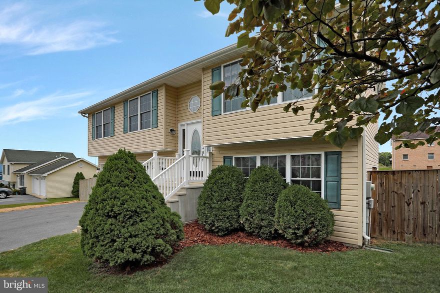 Well-maintained split foyer on quiet cul-de-sac backs to scenic farmland. New HVAC/heat pump installed April 2021! Kitchen and upstairs baths, updated in 2020, feature beautiful tilework. Handsome wainscotting in secondary bedroom. Spacious open floor plan. Car enthusiasts will love the oversized 2-car garage and  driveway with additional parking. Fully finished lower level offers enough space for office and/or family room as well as laundry room and half bath. Brand-new french doors in walkout basement open to  fully-fenced yard with above ground pool. Living room, dining room, kitchen and foyer scheduled to be professionally painted within next two weeks. Convenient to shopping, restaurants, parks, and community recreation. Just 5 minutes to I-81 and Martinsburg MARC Train station. Less than 15 minutes to Historic Shepardstown restaurants, shops and university. Short drive to Winchester VA, Hagerstown, MD and Historic Berkeley Springs, WV. Don't wait! This one won't last! Professional photos coming soon!