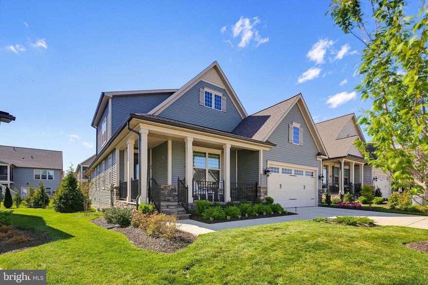 Elegant living on one of the community’s most desirable homesites.

Welcome to 2605 Broadleaf Drive, a stunning 3-bedroom, 4-full-bath single-family home located in the sought-after Bloomfields 55+ community.

Thoughtfully designed for both comfort and entertaining, this beautifully appointed residence offers refined living across three finished levels. Light-filled interiors, expansive open spaces, and carefully selected finishes create a home that feels both sophisticated and welcoming. Perfectly positioned on one of the largest lots in the community, the property also features a beautifully landscaped outdoor retreat designed for both quiet relaxation and effortless entertaining.

The main level showcases an expansive open-concept design where the living, dining, and kitchen areas flow seamlessly together, creating an ideal setting for everyday living and hosting guests. At the heart of the home, an oversized center island provides the perfect gathering space for family and friends. Sparkling white cabinetry, elegant quartz countertops, and sleek stainless steel appliances create a bright and sophisticated kitchen environment. Large windows fill the space with natural light as the layout continues into the spacious living room, anchored by an elegant fireplace that adds warmth and character. From here, step onto the screened-in covered porch, which extends the living space outdoors and leads to the custom patio and backyard, an exceptional outdoor retreat surrounded by extensive landscaping on one of the largest lots in the community.

Also located on the main level are two generously sized bedrooms. The primary suite continues the home’s bright and airy feel, offering a spacious bedroom with two large walk-in closets. The attached bath provides a spa-inspired experience with dual vanities and a large walk-in shower featuring dual shower heads. Just outside the suite, the conveniently located laundry room adds ease to everyday living. The mudroom area provides direct access to the two-car garage, creating a practical and welcoming transition space. Toward the front of the home, the second main-level bedroom includes a large closet and convenient access to a full bathroom.

Upstairs, a versatile open loft creates the perfect space for a family room, reading lounge, or shared gathering area. The third bedroom offers comfort and privacy with a spacious walk-in closet. The upper level is completed with another full bathroom and an additional storage area. 

The finished lower level offers expansive space for hosting gatherings and entertaining with ease. The open layout provides abundant room for games, media, or relaxed evenings at home. Rounding out this level is a full bath and large unfinished storage area.  

Beyond the home itself, the Bloomfields community offers an exceptional lifestyle. Thoughtfully designed around 15 acres of scenic parkland and walking trails, residents enjoy access to a centrally located clubhouse featuring a fitness center, pools, tennis courts, pickleball courts, a putting green, inviting outdoor fireplace areas, and a community herb garden with a potting shed. Numerous clubs and social activities provide endless opportunities to stay active and connected.

Located just minutes from the vibrant shops, dining, and cultural attractions of Downtown Frederick, this home offers the perfect blend of luxury, comfort, and low-maintenance living.

Don’t miss your opportunity to make 2605 Broadleaf Drive your next home!