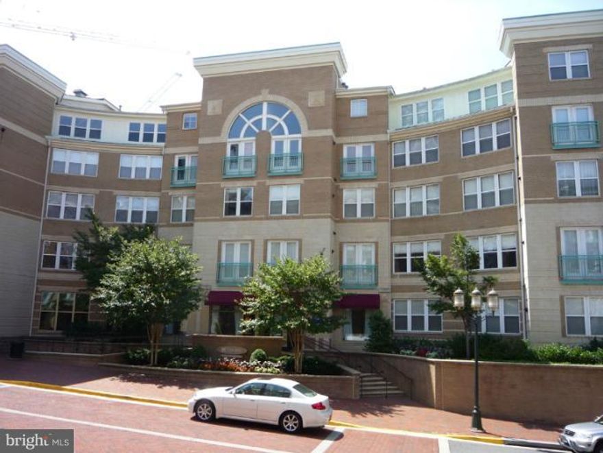 Exceptional! Secure building. Bright. Lots of light. Brazilian cherry hardwood 5" plank flooring, 9' ceilings, SS appliances, custom plantation shutters, pool w jacuzzi, gym, party room and business center in the heart of Reston Town Center! Comes w xtr wide handicap parking space.