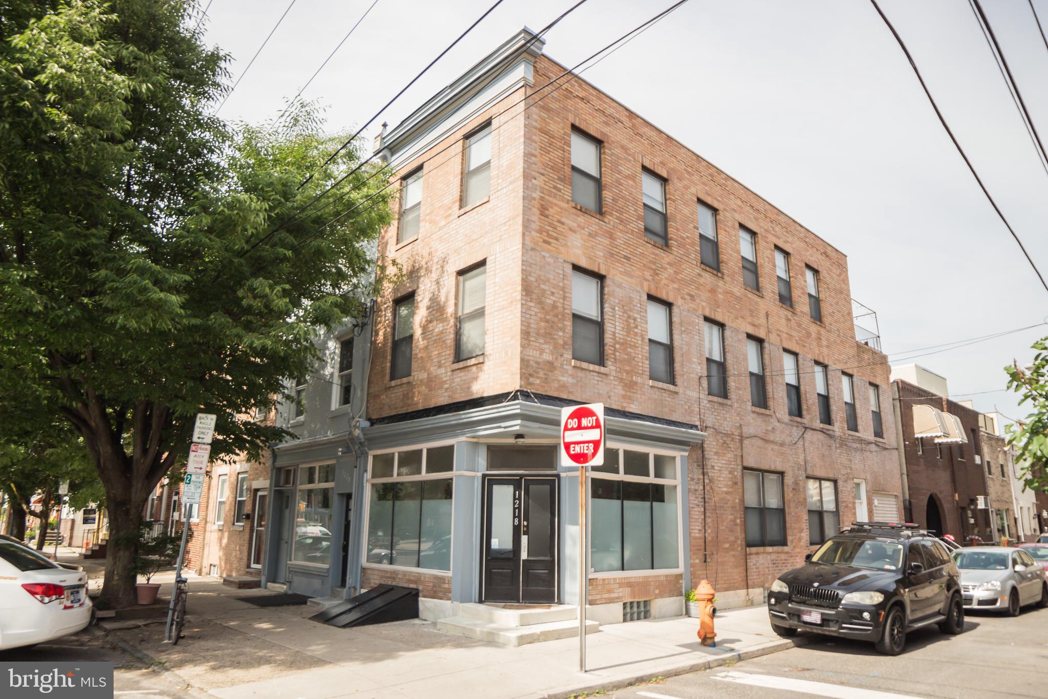 Available 7/1! Rarely available, very spacious 3rd floor, 1 bedroom, 1 bath apartment with deck, pine floors, great light with lots of windows and 3 exposures, all located on the corner of 11th & Latona. Fantastic Passyunk Square location. One block from shopping center, parks and great transportation. Common washer/dryer in basement, gas hot air heat with central air. No dogs, cats ok. Photos are from previous listing.