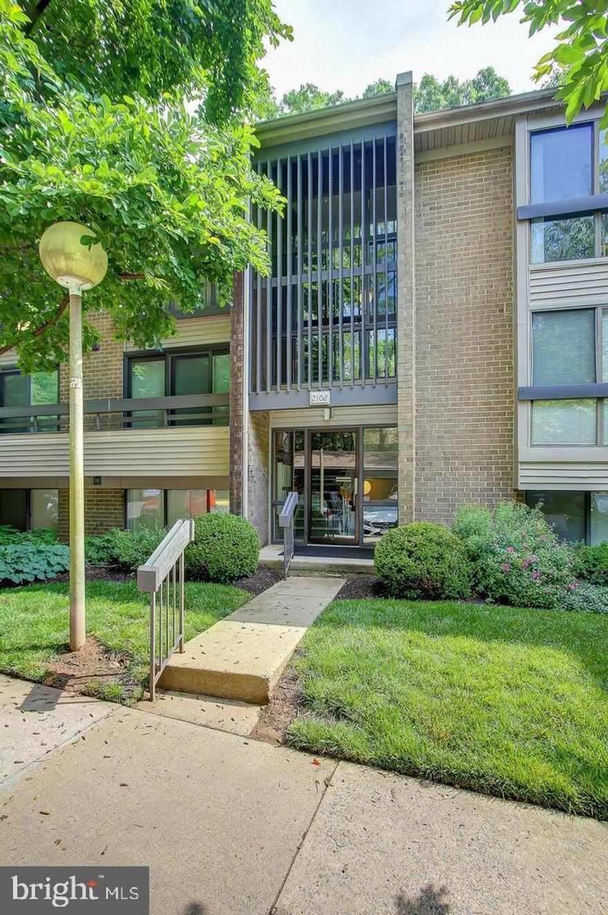 Enjoy quiet, convenient top-floor living in the heart of Reston! This home is perfectly situated near scenic trails and bus routes, with easy access to Wiehle Metro, the Toll Road, South Lakes Shopping Center, Reston Town Center, Lake Thoreau, and Reston Golf Course. The living room features vaulted ceilings and a stunning wall of windows offering peaceful tree views, along with direct access to your private balcony.

The bright, spacious kitchen includes a built-in pantry, perfect for extra storage. The primary bedroom is a true retreat, featuring two large closets and a beautifully renovated ensuite bath. A generously sized second bedroom provides additional comfort and flexibility. The separate dining room is ideal for entertaining, and the in-unit full-size washer and dryer add extra convenience.

This home comes with an assigned parking space, plus an additional unassigned space for guests or a second vehicle. With its central location and thoughtful updates, this home offers the best of Reston living!