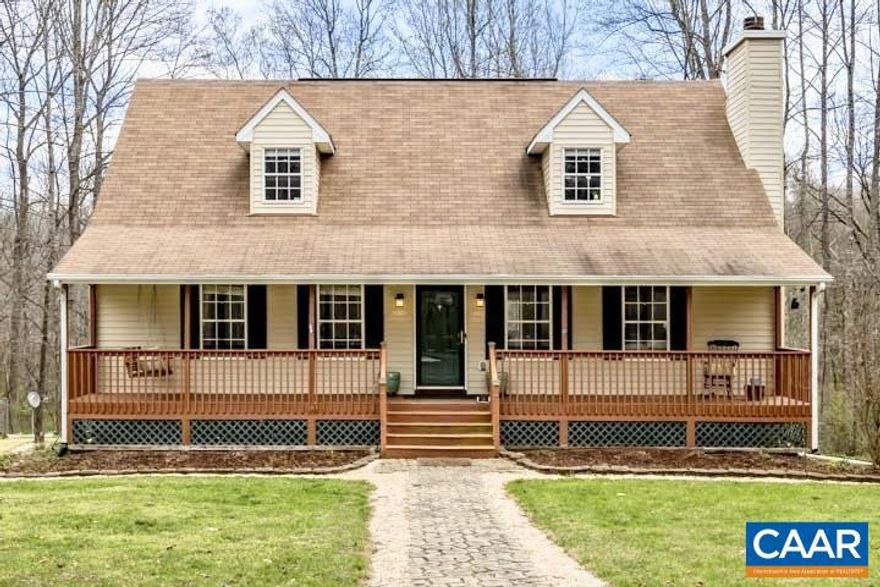 Tucked away on over 6.5 wooded acres, this 4-bedroom, 3-bath Cape Cod offers the perfect blend of space, privacy, and everyday functionality. The setting is peaceful and natural, with mature trees, a gently flowing creek, and plenty of room to spread out. Inside, the home offers a flexible layout with a main-level primary suite, hardwood flooring, and fresh interior paint throughout. The kitchen features granite countertops, maple cabinetry, and opens directly to an expansive, multi-level rear deck - ideal for outdoor dining and entertaining. The walk-out basement provides additional finished space with a cozy wood burning stove plus abundant storage. A detached 3-car garage/workshop and paved driveway offer ample room for vehicles, equipment, or projects, with additional space for RV parking. Enjoy cozy evenings with both gas and wood-burning fireplaces, and take advantage of the property?s versatility?whether for gardening, pets, or simply enjoying the outdoors. Located just minutes from Route 29, with convenient access to shopping and dining, and approximately 20 minutes to NGIC. High speed Comcast internet available and Firefly is in the neiborhood if owner desires to hook up fiber.,Granite Counter,Wood Cabinets,Fireplace in Basement,Fireplace in Living Room