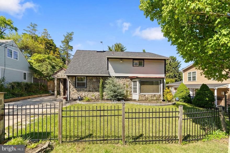 Sun-drenched 4BR/2BA Rockville charmer with 2,345 sq. ft. of light-filled living space! Two main-level bedrooms feature gleaming wood floors and a charming bay window. The expansive great room addition is made for gathering, while the show stopping sunroom — crowned by six skylights — bathes wood floors in natural light all day. Create amazing meals in the updated kitchen with stainless steel appliances. Upstairs offers brand-new carpet in every bedroom, and fresh contemporary paint runs throughout the entire home. NEW ROOF (July 2025) for total peace of mind. The deep backyard delivers room to roam, plus a large storage area and a dedicated BBQ shed for easy outdoor entertaining. Just minutes to Rockville Town Square's restaurants, theater, library, Metro & MARC. Classic character, modern updates, unbeatable commute. Move-in ready and waiting for you!