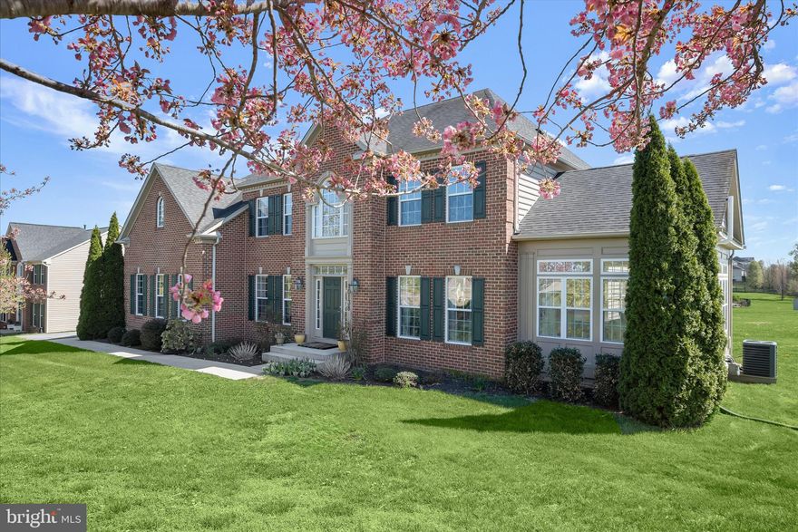 Welcome to 10138 Roulette Drive, a stunning Colonial nestled in the desirable community of Claggetts Mill, offering an elegant blend of comfort, space, and timeless design. This beautifully maintained home features five spacious bedrooms, three full, and two half baths, thoughtfully arranged within a light-filled open floor plan accented by hardwood floors, classic moldings, tray ceilings, and stately columns.
A dramatic two-story foyer welcomes you inside and is gracefully flanked by formal living and dining rooms adorned with elegant columns and detailed moldings. Just beyond, a sunroom off the living room captures spectacular pastoral views, creating a peaceful space to relax and unwind. The heart of the home is the expansive eat-in kitchen, perfectly designed for both everyday living and entertaining. It features a center island, sleek stainless steel appliances including a double wall oven and cooktop, ample cabinetry, a pantry, a convenient butler’s pantry, a breakfast bar, and a sun-filled breakfast room. The kitchen flows seamlessly into the impressive two-story family room, where a cozy gas fireplace serves as a warm and inviting focal point.
The main level also offers a private office with French doors, a versatile bonus room with cathedral ceilings, laundry room, powder room, second staircase, and direct access to the attached garage. Upstairs, the spacious primary suite provides a true retreat with a walk-in closet and a luxurious en-suite bath featuring a soaking tub and walk-in shower. Four additional bedrooms complete the upper level, including one with its own en-suite bath, while the remaining bedrooms share a well-appointed dual-entry full bath.
The fully finished lower level expands the living space with a media room, a game room with a second fireplace, an impressive indoor batting cage, and a large storage area. Set on a generous 0.7-acre lot, the level yard offers endless possibilities for outdoor enjoyment. With an attached garage and paved driveway, this exceptional home delivers the perfect combination of style, functionality, and serene living.