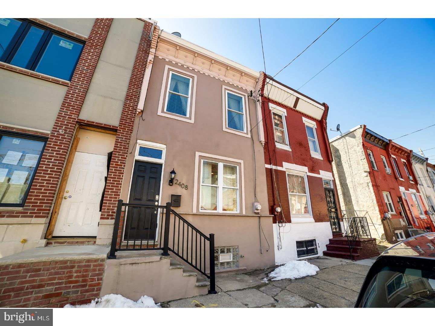 This beautiful 3 bedroom, 1.5 bathroom home is in the heart of bustling Point Breeze! Enter into the living room, featuring hardwood floors, gorgeous exposed brick accent wall, and half bath. Walk through the spacious open floor plan into the kitchen, boasting tasteful espresso cabinets, stainless steel gas range and appliances, white granite countertops, and subway tile backsplash. Off the kitchen, you'll find the breezy back patio, ideal for grilling and chilling. The second floor holds all three bedrooms, including the large master with dual closets. The full bath features a tiled shower and a dark wood vanity. Don't forget about the large finished basement, offering a ton of bonus space and newly installed storage shelves! The home is connected to an ADT security system and is just a short walk to community staples like Sidecar Bar, On Point, Schuylkill dog park and trail. Don't miss your chance to call this Point Breeze gem your own!