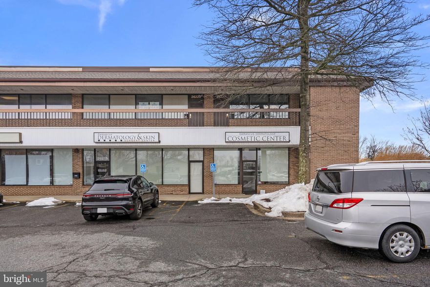 Commercial condominium opportunity available for both sale and lease in the well-positioned Damascus Square. Located on the upper level of an established office building, this versatile space was previously utilized for medical use, offering a functional, large open layout well-suited for a variety of applications. Inside, you’ll find a bright, carpeted interior enhanced by abundant natural light and classic chair rail detailing—an ideal setting for a welcoming reception or lobby area. The space flows into a generously sized open office area, providing flexibility. A convenient half bathroom adds to the practicality of the layout. Positioned just off a main road, the property benefits from excellent visibility and accessibility. A large shared parking lot provides ample parking for clients and staff alike, while the surrounding area features a strong mix of established businesses that contribute to steady foot and vehicle traffic. Convenient access to Routes 108 and 27 further enhances connectivity for commuters and clientele. This is an exceptional opportunity to establish or expand your business in a thriving and highly accessible commercial setting.