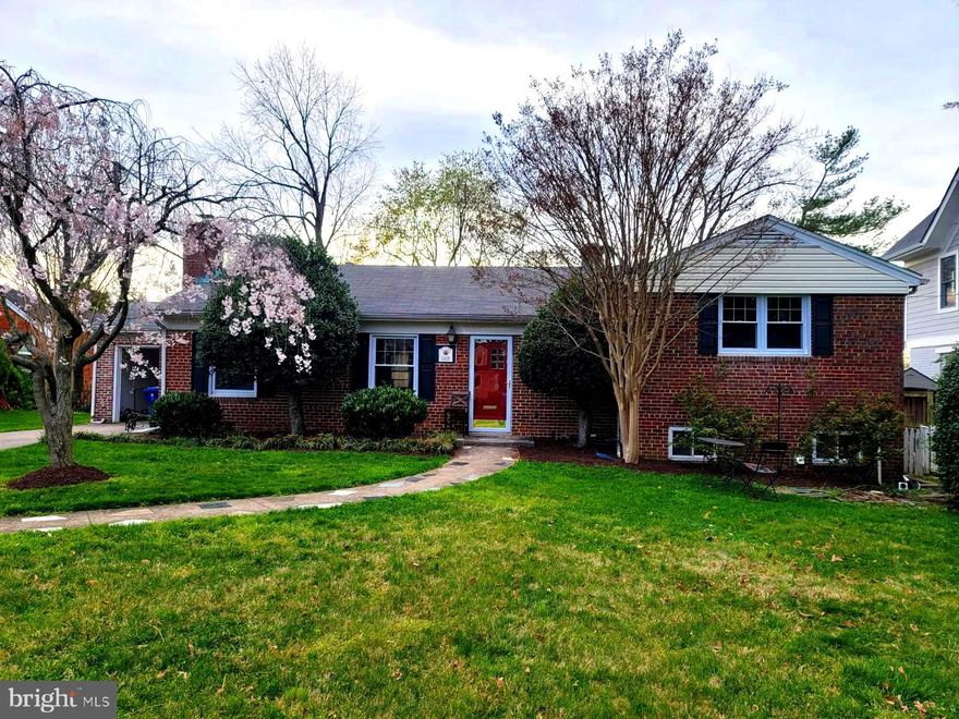 Ideal location. Light-filled, single-family brick home on a large lot with beautiful hardwood floors throughout.  The main level showcases a formal living room with fireplace, renovated eat-in kitchen with island, granite countertops, and custom cabinets, half bath, 4-season sunroom, and bedroom with attached office/sitting room that is being shown as a family room. Upper level has updated Jack & Jill bathroom connecting 2 spacious bedrooms. Finished lower level rec room has adjoining full bath and laundry room, that can be used as 4th bedroom. Plus, almost 1,000 square feet of storage.  Garage parking & fenced-in private backyard backing to school athletic field. Don’t wait long as this one won’t last.