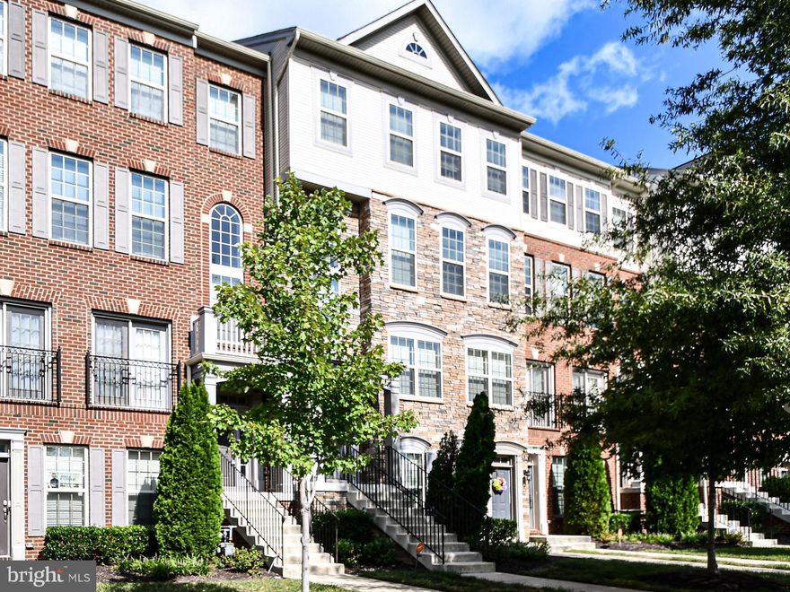 Welcome to your dream condo located in the vibrant community of Woodmore Town Center! This stunning 3-bedroom, 2.5-bathroom home spans 2,300 square feet of luxurious living space, offering the perfect blend of comfort and style.

Built in 2016, this modern residence features an open concept floor plan with a modest front porch and an elegant stone front facade. As you step inside, you'll be greeted by the bright and airy living space, complete with white cabinets, an oversized center island in the kitchen, and in-unit laundry for added convenience.

The highlight of this home is the spacious master bedroom, boasting a huge walk-in shower and custom closets designed by Closets of America. Step outside onto one of the two back decks. Breathtaking views of the park and commercial shopping area are available out of the front windows.

But the perks don't end there! This condo also offers one garage space for parking and grants you access to a wealth of amenities, including a clubhouse, gym, lap pool, playgrounds, and sports courts. With convenient metro access and proximity to shopping and entertainment, this is the ideal place to call home. Don't miss out on the opportunity to own this exceptional property in Woodmore Town Center!