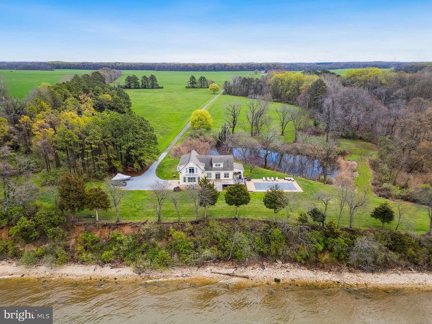 Welcome to your own private paradise nestled upon a picturesque 23.5-acre expanse along the edge of the peaceful Chesapeake Bay. It is here where you can enjoy an abundance of seasonal and local wildlife such as Bald Eagles, ospreys, Canada geese, ducks, bluebirds, turkey, and whitetail deer. There is an ideal blend of tillable and wooded acreage providing for an array of activities including hunting, farming, and gardening. Plenty of room to build a sizable barn for shop, livestock, or hobby use. The expansive 700' of waterfront is ideal for small watercraft, swimming, fishing kayaking and Crabbing.  The residence offers a rich blend of traditional style with coastal charm and commands breathtaking views of the shimmering Chesapeake Bay waters. Large and expansive windows ignite the bay’s gentle breeze and warming sunlight into every corner. Upon entering the home, you are greeted with an expansive open floor plan including  beamed cathedral ceilings and airy light-filled atmosphere. The open kitchen and dining area provide the perfect gathering area for family and guests to enjoy the Chesapeake Bay views, the in-ground concrete pool, and the outside wrap around porch setting. The large loft area is ideal for converting to a second primary suite or as it is now, as a recreation room. This waterfront retreat offers conveniences to both Rock Hall and Chestertown with a perfect blend of tranquility, accessibility and privacy. Gorgeous sunsets add to the allure of this exceptional property!