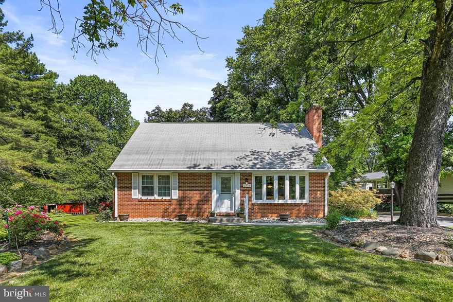 Updated and move in ready 3 bedroom 2 full bath Cape Cod home in the Carrolltowne school district, situated on a level 1/2 acre on a quiet cul-de-sac. The main level features an updated kitchen with stainless steel appliances and granite counters, a separate dining area with hardwood floors, crown and chair rail molding and wainscotting, a living room with hardwood floors, built in bookshelves and a wood stove insert, as well as the primary bedroom with an updated full bath with a roman shower and an expansive walk-in closet. Upstairs you will find two more roomy and bright bedrooms, both with hardwood floors and walk-in closets, along with the 2nd full bath. The lower level has been recently finished with a spacious family room, and has a separate storage/laundry room with walkout stairs to the rear yard. Both the front and rear yard are beautifully landscaped. The rear yard has a new paver patio and a shed. Along with newer windows, a new 200 amp electric panel, and numerous custom updates throughout the home, this is not your traditional Cape Cod home.