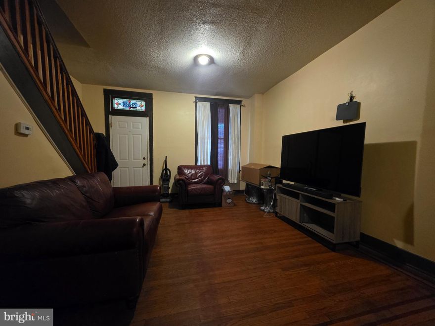 Investor or Owner-Occupant Opportunity
Welcome to 2730 E Chase St. A 2-bedroom, 2-bath interior brick rowhome currently tenant-occupied and in livable, move-in ready condition being sold As-Is. Property will convey vacant at settlement, offering flexibility for immediate occupancy or renovation updates.

Estimated market rent of approximately $1,500/month. After cosmetic improvements, projected ARV up to $170,000 with the right renovations. Major systems are in good working order, providing a solid foundation for value-add potential.

Features include original hardwood floors, open main-level layout, ceiling fans, and a partially finished basement with a full bathroom. Low-maintenance lot and convenient access to public transportation.

Ideal for investors seeking a light rehab for rental or resale, or buyers looking to move in now and update over time while building equity. Schedule a tour today, this great property won't last long!