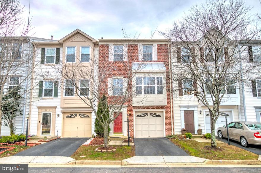 Beautiful townhouse with 3 Bedrooms, Two full bath and Two half bath. New Fresh paint, new carpet, Granite tops, Stainless steel appliances, hardwood floors on main level, one car garage, and additional one assigned parking space! Private Large deck back to wood.  Finished basement with brick patio. Master suite with walk-in closet, full bath w/soaking tub and sep shower. Walking distance to grocery store, pool & tennis.