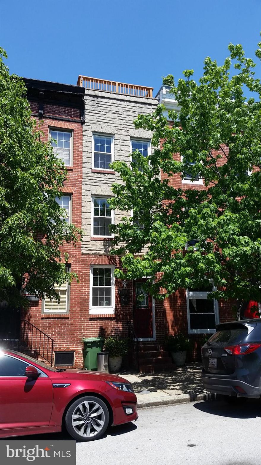 2 bedroom 2 full bath in a prime Canton location. Stainless steel appliances & cherry stained wood cabinets in the kitchen. Exposed brick and hardwood flooring throughout. Vaulted ceilings in the master bedroom. Private bath in both rooms. Spacious rooftop deck w/ incredible views of the City skyline including the water. Covered back patio. Walking distance to Canton Square and Fells Point.