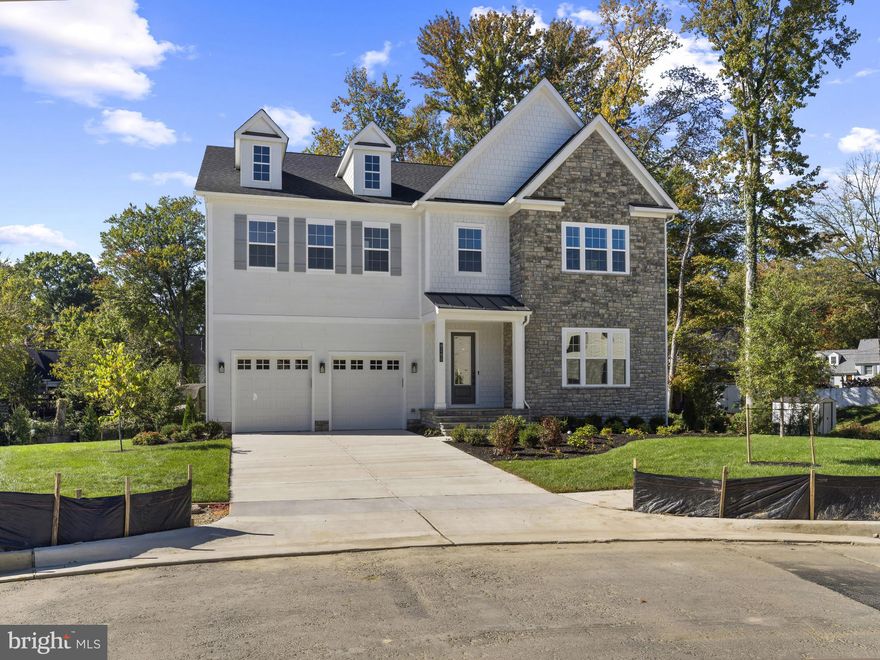 Welcome to the crown jewel of Collingwood Chase—a private, luxury enclave of just seven homes in Alexandria, VA. This exceptional Hampton II by D.R. Horton EMERALD sits on the largest and most private homesite in the community, offering unmatched outdoor space, privacy, and curb appeal.

Set on a premium corner lot at the end of the cul-de-sac, this estate-sized property offers an expansive yard rarely found in new construction! With just shy of 7,000 square feet of refined interior space, 6 bedrooms, 6.5 bathrooms, and a 2-car garage with EV charging, this home is the ultimate blend of elegance and functionality.

Inside, you’re greeted by a dramatic two-story foyer and 10-foot ceilings that frame the main living areas in natural light. The chef’s kitchen includes quartz countertops, upgraded cabinetry, premium KitchenAid appliances, and an oversized island that anchors the open-concept design. The double 8-foot sliding doors provide incredible views of the expansive backyard.

Perfect for multigenerational living or guests, the main-level suite features a private bath and walk-in closet. Upstairs, the primary suite is a true sanctuary with two walk-in closets, a spa bath with soaking tub and glass walk-through shower, and a built-in coffee bar for your morning routine.
The walk-up basement includes a finished rec room, bedroom and bath, and a sleek mini bar—perfect for entertaining or relaxing.

This is the only lot of its kind in Collingwood Chase. With extra space to grow, play, and entertain—this home redefines luxury living in Alexandria.

This home is available for immediate move-in. Reach out to discuss current promotions and incentives. 
Don't miss your opportunity to own the most coveted lot in this one-of-a-kind community— schedule your private consult about Collingwood Chase today.