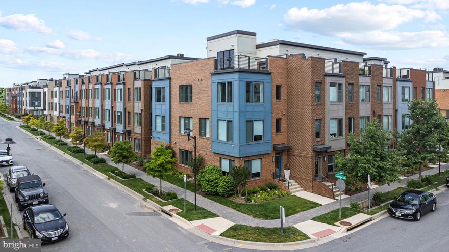 AVAILABLE NOW! Perfectly situated at the doorstep to the red line, Westside At Shady Grove has the amenities you want combined with a convenient location. Built by EYA Homes in 2018, this LEED certified is  1 of 10 EYA built Davis Model townhomes. Features include an entry level generational suite with office, in-ceiling speakers on main level, hardwood floors throughout, an expansive 4th level rooftop terrace with outdoor lounge and dining areas, in ground irrigation system and ample amount of upgrades throughout. Entry level features an office with glass doors that flows through the wet bar area into the 4th bedroom with a full bathroom. For those who love to entertain, host dinner parties or just simply relax from a long day, then you will love the main level. From the first step off the landing of the stairwell you are immersed in sunlight and taken back by the sophisticated open floor plan, that effortlessly flows from living room to kitchen, dining area, family room and half bath. After those long days you will feel at home in your primary bedroom oasis, that features a hallway with two custom built walk-in closets, a linen closet, a spacious sized bedroom area and a calming spa-like bathroom. Completing upstairs are two additional bedrooms with walk-in closets, a 3rd full bathroom, laundry room and an additional linen closet. With nearly a 1,000 SQFT roof terrace with two living areas, a dining area, gas fireplace, built-in gas line for grilling and a rough-in for a full outdoor kitchen, you'll find it the perfect way to dine al fresco or simply unwind. Westside at Shady Grove is a lifestyle neighborhood that perfectly combines urban living with the amenities of the suburbs. Imagine taking a morning stroll to Starbucks for coffee, enjoying an afternoon drink at the local beer & wine store, stopping by CVS (under construction), walking to the Metro to catch a concert or game in DC all within your door step. Community amenities include the clubhouse ( with party room, meeting room, high-end fitness center, outdoor pool, fire pit, picnic/ lounge areas), 2 dog parks and walking paths connecting to nearby trails. HOA covers lawn maintenance & snow removal, so no need to ever worry! Currently under construction in the neighborhood is CVS, Lenscrafter, and future restaurants/retail. Two miles from I-270 off I-370, 4 miles to Crown Farm, 14 miles to downtown Bethesda & 26 Miles to DCA.