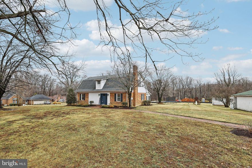 Welcome to this charming Cape Cod set on a 3-acre lot in Manassas, offering the perfect blend of privacy, space, and opportunity. With over 2,000 square feet, 3 bedrooms, and 2.5 baths, this home delivers classic character and a flexible layout ready for its next chapter.

The main level features a spacious living room creating a warm and inviting focal point. The kitchen offers generous cabinet space and functionality, with room to personalize and make your own. Multiple living and dining areas provide versatility for everyday living, entertaining, or future redesign. Upstairs, comfortable bedrooms offer natural light and peaceful views of the surrounding property.

Outside, the expansive 3-acre setting is the true highlight — mature trees, open space, and endless possibilities. Whether you envision outdoor entertaining, gardening, recreational use, or future expansion, this property provides the land and freedom to bring your ideas to life. A detached 2-car garage adds valuable storage, workspace, and a half bath.

No HOA. Private well and septic. Conveniently located near major commuter routes, shopping, and dining while still offering a serene, tucked-away feel.

A rare opportunity to own acreage in Prince William County with space to live, grow, and create long-term value.