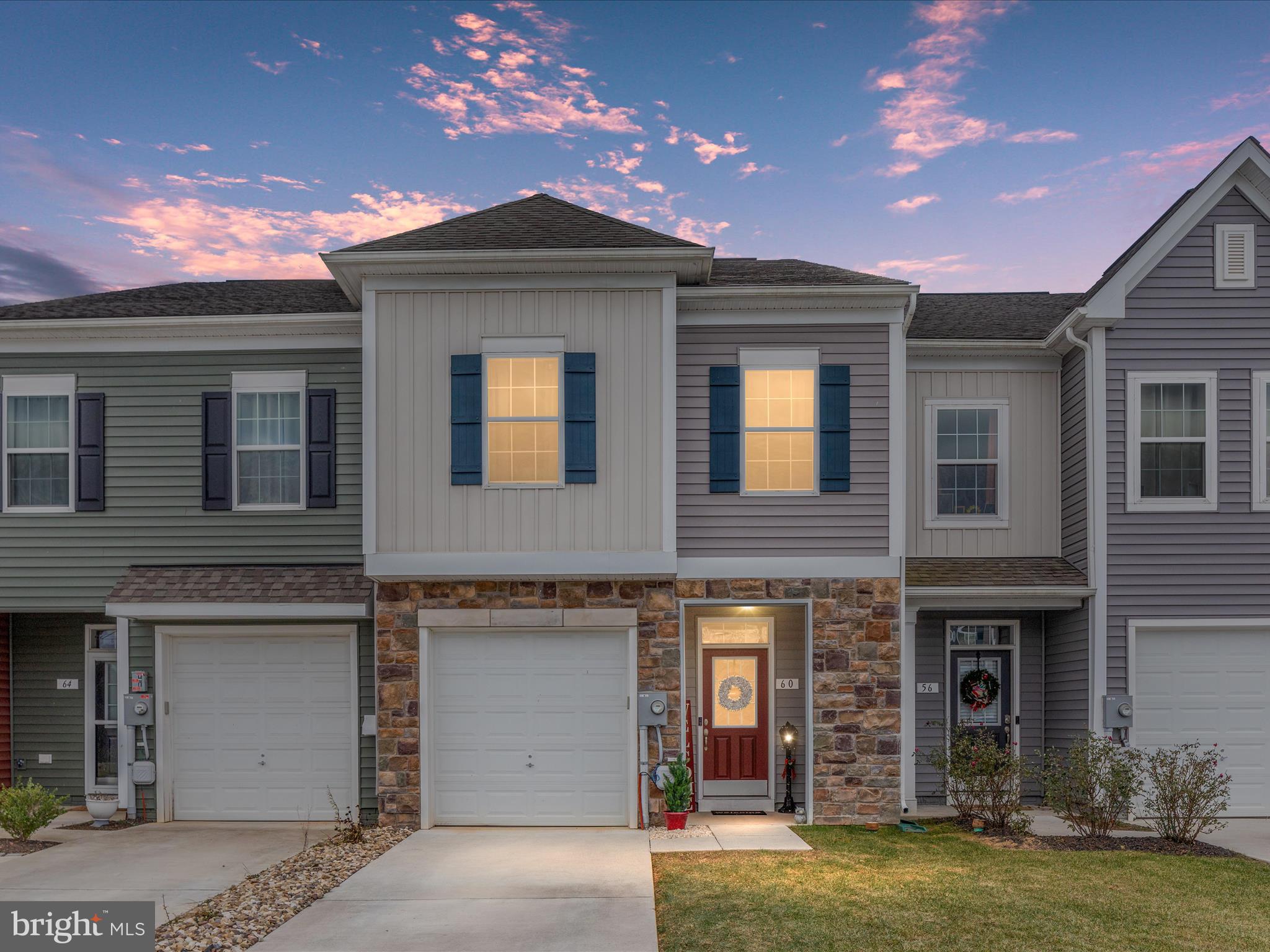 NEW PRICE!!
You won't be disappointed, and you are welcomed to this beautifully maintained, nearly new townhome boasting modern upgrades and a prime location just minutes from the Virginia border. This home offers fresh paint and luxury plank flooring throughout most of the space, creating a stylish and low-maintenance living environment. The open floor plan centers around a stunning kitchen with a large eat-up island, sleek tile back splash, and modern amenities perfect for entertaining and daily living. The spacious primary bedroom suite features a tray ceiling, walk-in closet and a deluxe master bathroom with double vanity sinks and a walk-in shower. Built with an array of premium builder upgrades, this townhome provides both comfort and sophistication. Don't miss this opportunity to enjoy a home with all the perks of modern living in a fantastic location!