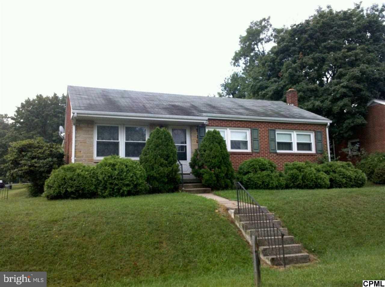 Big things really do come in small packages!!!!! Enjoy the Summer on the large covered rear porch or the spacious backyard.This charming freshly painted all brick ranch has it all. Central air, hardwood floors, replacement windows and an updated kitchen. The only thing missing is you!
