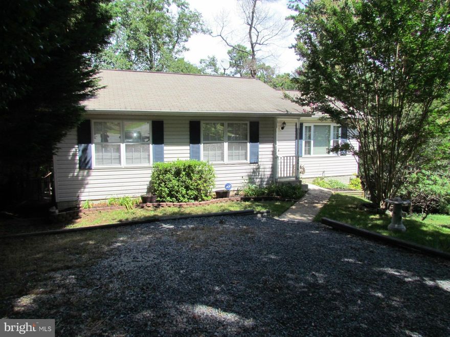 Charming rambler features 3 bedrooms, 2.5 baths w/ a basement. Large eat-in kitchen has SS appliances, plenty of cabinets/counter space & access to the rear deck. Basement is partially finished w/ large family room & 1/2 bath and has plenty of storage space. Additional features include wood flooring, upgraded light fixtures and has been recently painted. Property backs to trees. Also for For Sale.