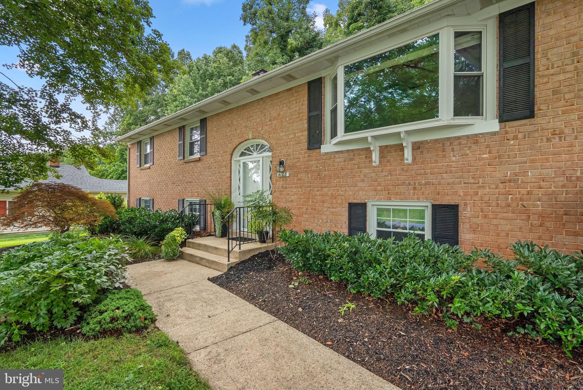 Welcome to this beautifully maintained and move-in-ready home, situated on the most gorgeous lot in town! Pride of ownership is evident as you pull into the driveway. Beautiful landscaping welcomes you in. Hardwood floors carry throughout the main level; the primary suite also has hardwoods below the carpet! The spacious family room has an open and airy feel thanks to the large bay window overlooking the front lot! The kitchen has space for a table, and tons of storage thanks to the built-in cabinetry along three walls! The lower level has been completely redone with new floors and new paint! The 4th bedroom is the perfect space for welcoming guests or for a home office with large windows and beautiful built-ins! Don't miss all of the storage on this level! The family room on this level walks out to the gorgeous backyard. Private, tree-lined views of never-to-be-developed land, a spacious deck and patio, where you can relax after a long day. You truly feel like you are miles outside of town while being just minutes to shops, dining, and major commuter roads; it is truly a little slice of paradise! You won't want to miss this one, so be sure to call for your private showing TODAY!