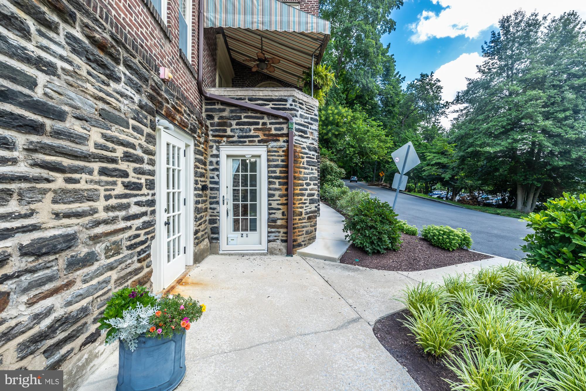 Merion Manor – Perfectly Pleasing in Every Way! Located in the desirable Merion Manor Condominium Community—where suburban charm meets unbeatable convenience. This sought-after area is known for excellent schools, a relaxed neighborhood vibe, and easy access to major cities, shopping, dining, and cultural hot spots. First-floor living at its finest—freshly renovated and ready for you!
As soon as you step inside, you'll notice the beautiful new flooring that adds richness and warmth to every room. There's a comfortable sitting room at the entry—perfect for a quiet spot to unwind—with plenty of closet space for coats, bags, and everyday essentials. The living room is roomy and well laid out—great for entertaining and everyday living. The kitchen is modern and stylish, with granite countertops, newer stainless steel appliances (yes, including a self-cleaning oven, dishwasher, and refrigerator), and space to cook and create with ease. The primary bedroom offers peace and privacy with a sliding barn door and generous closets. There’s also a guest bedroom—ideal for visitors, a home office, or whatever you need it to be. The bathroom includes modern touches and even a little extra storage space (because who doesn’t love more storage?). Need more room? No problem—additional storage for this unit is located just a short walk away. Commuting? You’ll love the easy access to both local train lines and Amtrak—convenient, quick, and stress-free. If you're looking for comfort, convenience, and character all in one place—this is it.
This one is truly move-in ready and waiting for the right new owner to love it!