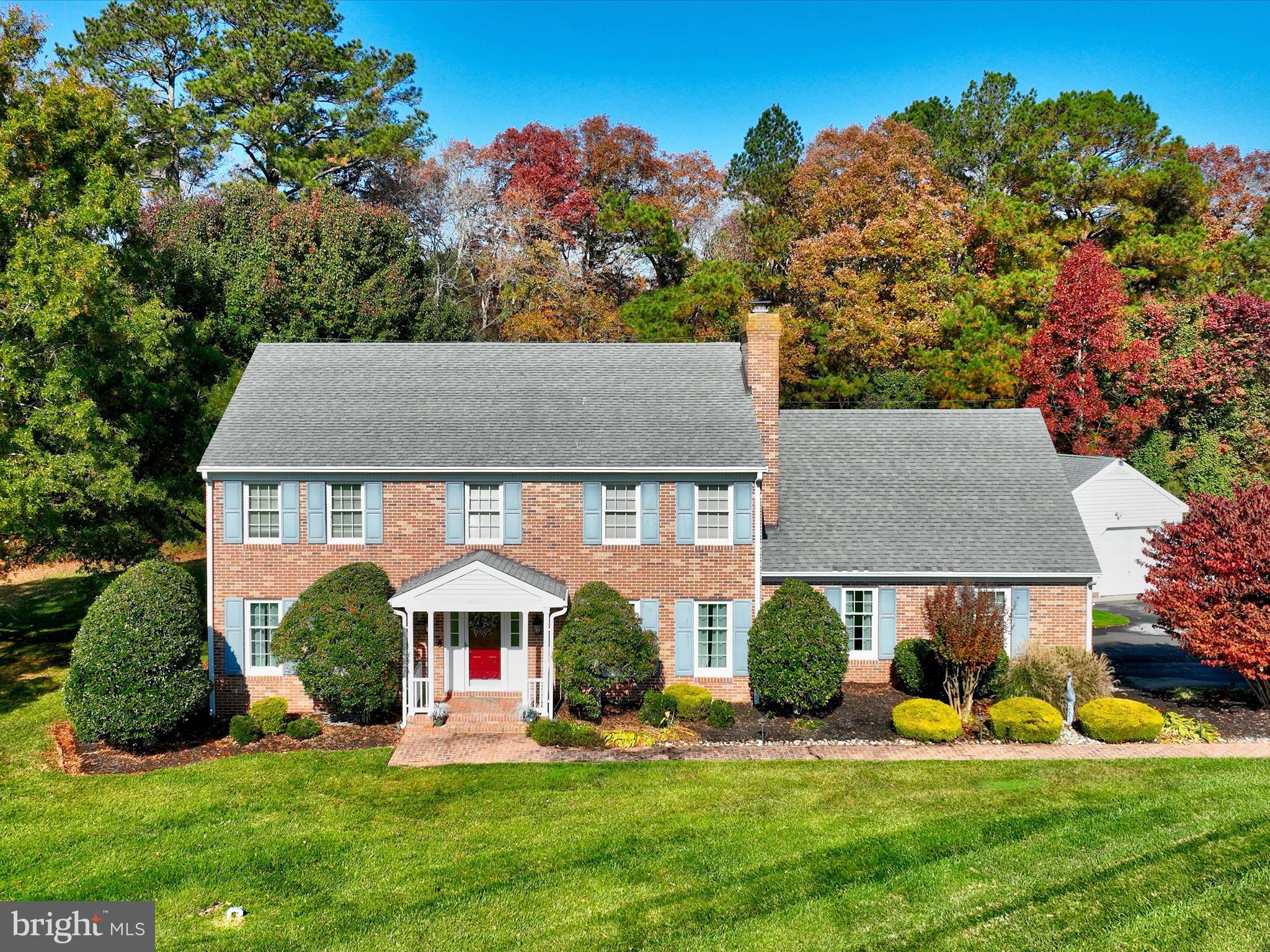 Welcome to 30602 Foxchase Dr, Salisbury MD – This beautiful colonial home boasts breathtaking views overlooking a serene pond, offering a picturesque backdrop to your everyday life. From its top-notch condition to its abundance of upgrades and extras, this residence is sure to captivate anyone looking for exceptional quality. Step inside and be greeted by a spacious sunroom, measuring an impressive 21x13 feet, inviting ample natural light to flood the living spaces. The primary bedroom features a luxurious theatre/sitting room spanning 19x13 feet, providing a private sanctuary for relaxation and rejuvenation. Throughout the home, numerous improvements have been made to enhance both functionality and aesthetic appeal. The home shows beautifully highlighted by its meticulously landscaped yard with planters, fences, and brick-lined pathways - every detail has been carefully considered. Indulge in modern conveniences such as multi-room whole home audio, new composite deck, and renovated kitchen complete with granite countertops, crown molding, and premium appliances. Entertain guests in style in the family room, featuring a refaced fireplace, hardwood floors, and integrated sound system. No detail has been spared in the renovation of this home, from the re-roofing to the installation of new windows, ensuring years of comfort and peace of mind for its lucky new owners. With its theater room, renovated bathrooms, and primary suite retreat, this residence truly offers the epitome of luxury living. Outside, enjoy evenings on the patio or take in the beauty of the landscaped gardens illuminated by new landscape lighting. The addition of Ring Security provides added peace of mind, while the vinyl fence surrounding the HVAC systems and side yard ensures both privacy and functionality. There’s even a small personal elevator to make easy trips between floors. And a fully-renovated detached garage that provides the perfect bonus game room! Experience the epitome of elegance and luxury living at 30602 Foxchase Dr. Don't miss your chance to make this stunning colonial home yours – schedule your private tour today!