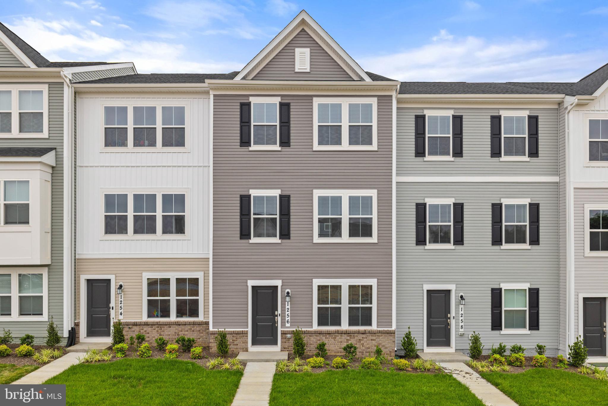 Welcome to this pristine, never-before-lived-in Lancaster townhome—offering an abundance of natural light across three finished levels. With three spacious bedrooms, two full baths, two half baths, and a two-car garage, this residence seamlessly blends style and function.
On the entry level, a versatile recreation space awaits—perfect as a home office, gym, or media lounge—alongside a convenient powder room and rear-entry two-car garage. The main level features a modern open-concept layout that flows effortlessly from the expansive Great Room to the dining area and chef-inspired kitchen, complete with upgraded granite countertops, premium cabinetry, and stainless steel appliances. Step outside to a generous 10x18 deck—ideal for entertaining or enjoying your morning coffee in the fresh air.
Upstairs, the private owner’s suite features a luxurious en-suite bathroom and a walk-in closet, accompanied by two additional bedrooms and a full bath—providing space for everyone to feel at home.
Nestled just minutes from Charles Town and Ranson, Red Clover Meadows offers easy access to local favorites like Martin’s, Weis, Marshalls, Kohl’s, Five Guys, and more. Major conveniences like Home Depot and McDonald’s are also nearby.
Tenant Information: Monthly Rent: $2,100, Security Deposit: $2,100, Pets case by case basis, Pet deposit $500, Minimum credit score: 650, Income requirement: 3x monthly rent. Tenant covers: lawn care, electricity, cable/internet, water/sewer, trash. Landlord covers: HOA dues. Application via RentSpree—link available in the listing. Step into easy living with high style and low maintenance—this stunning townhome is ready to welcome its first resident.